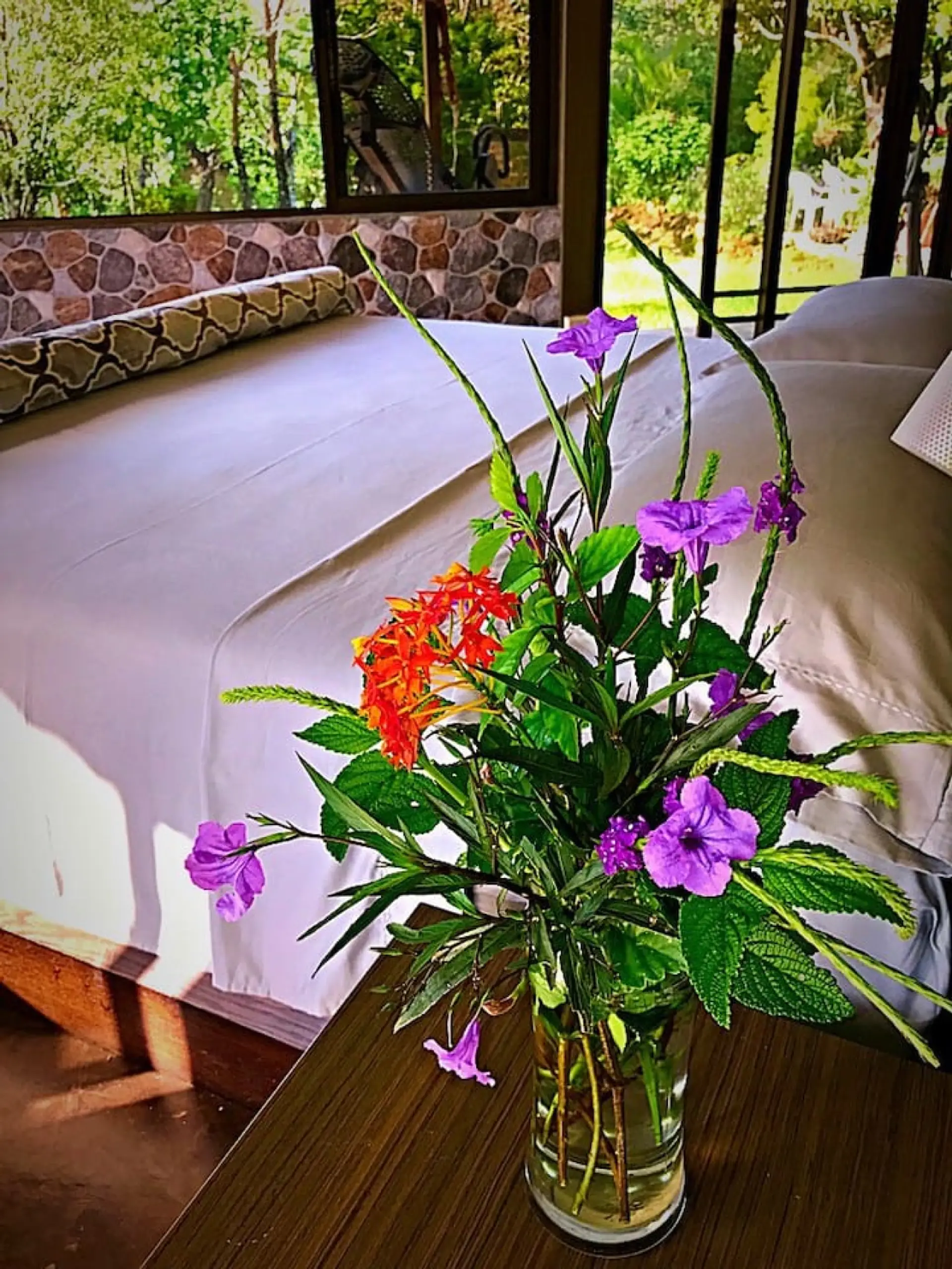 Enjoy the best view in the house from the King sized Bed in the back of the Living Room.