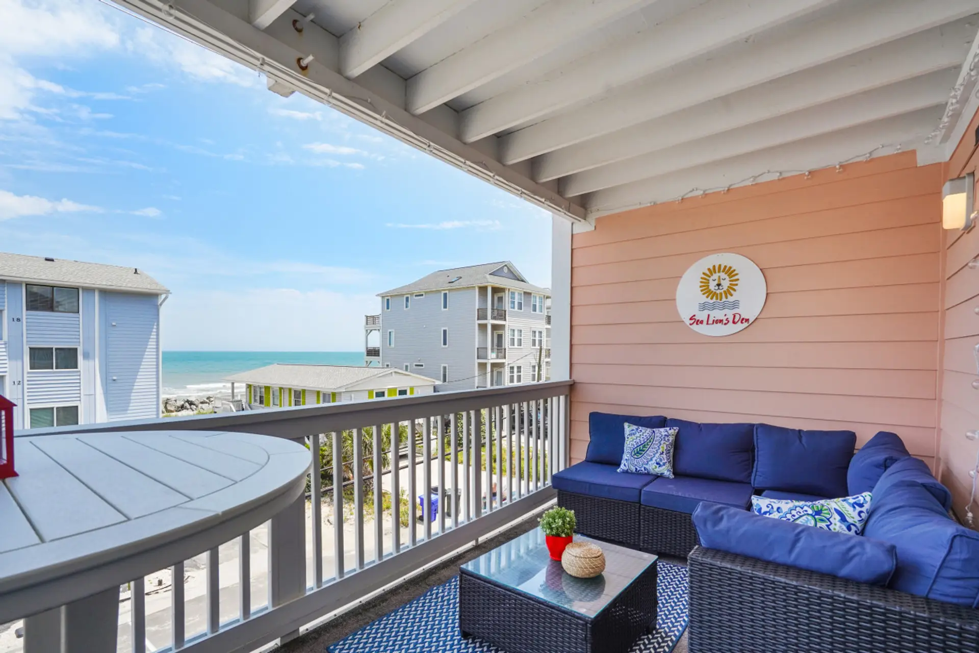 Relax on the covered balcony with ocean views