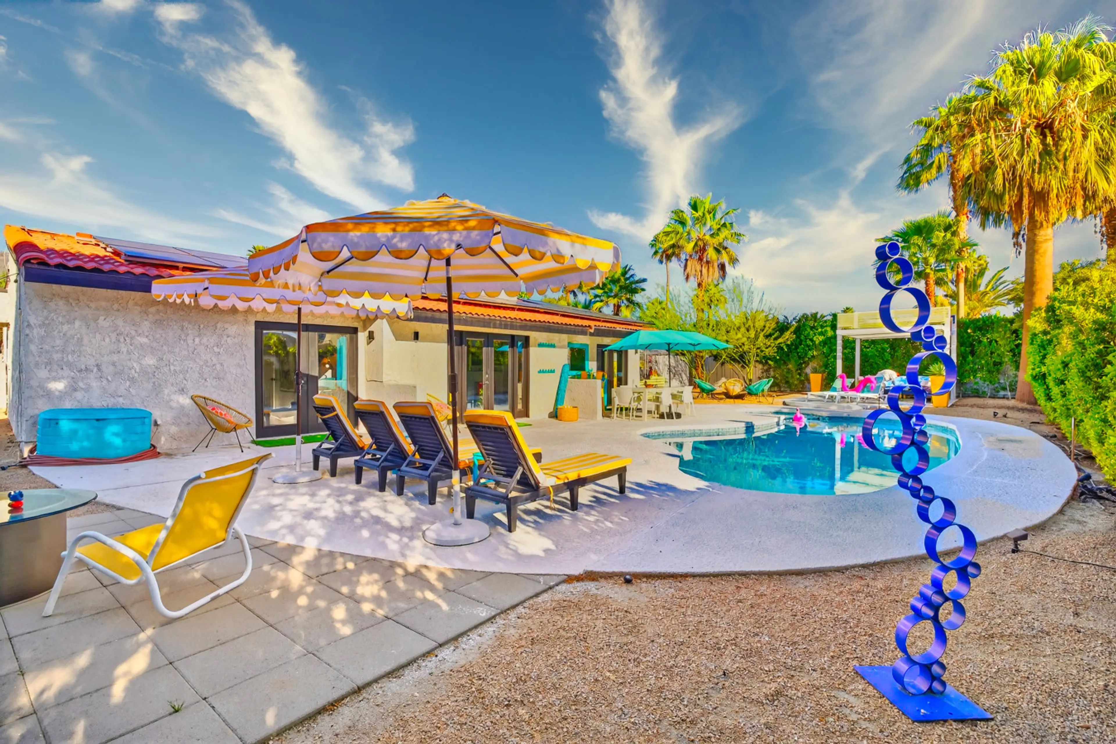 Welcome to Palm Springs Poolside, a colorful desert retreat perfect for girls trips, bachelorette parties, and family vacations.