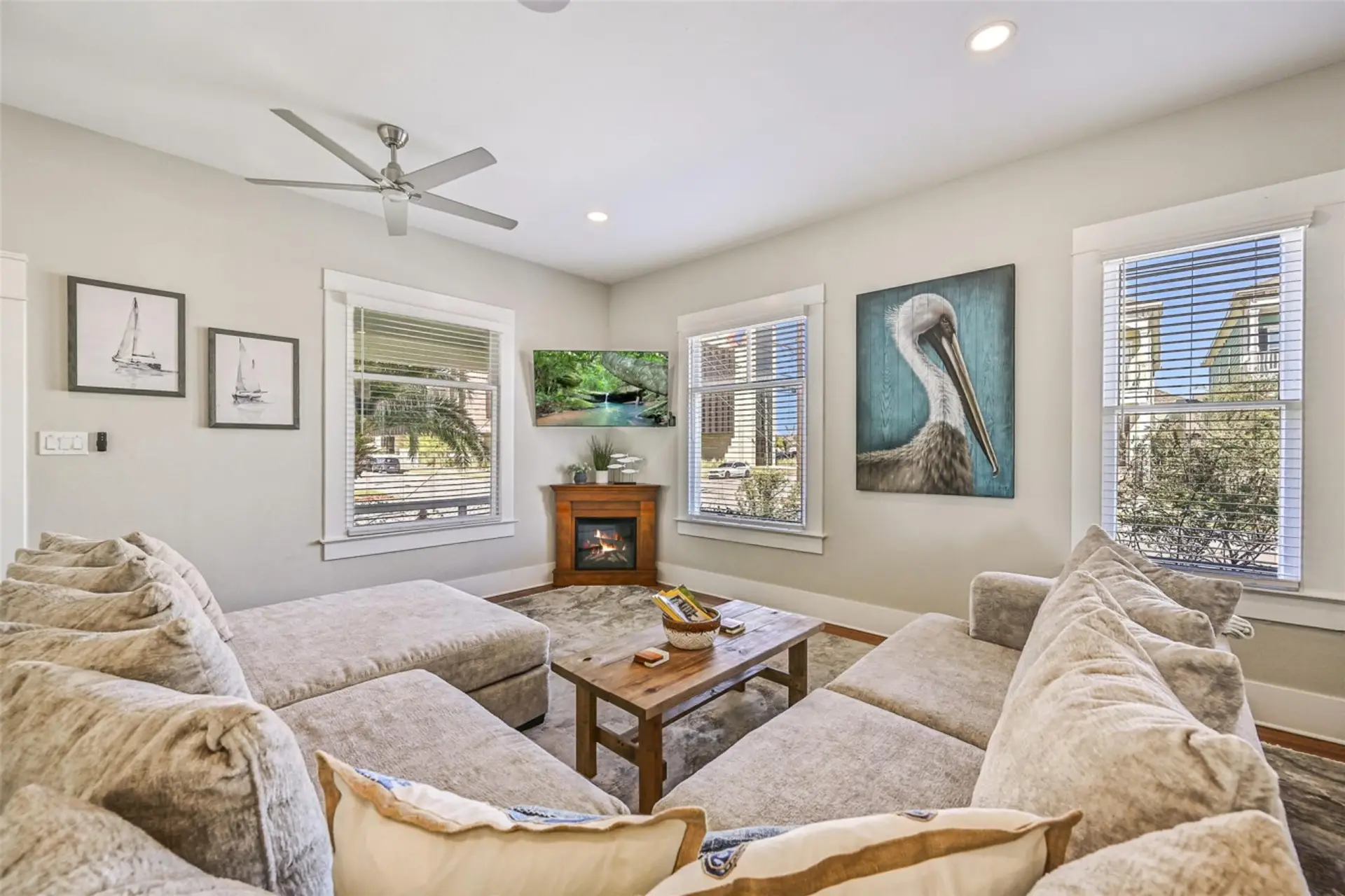 Inviting and Relaxing Living Space with Smart TV and Coastal Décor