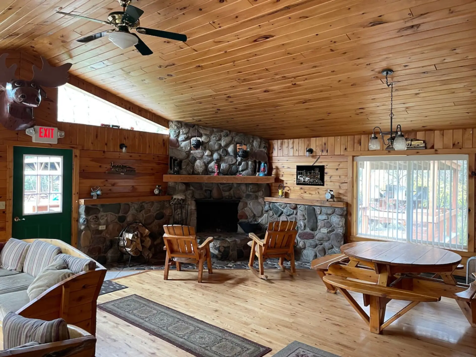Brimley Lodge - Wood burning fireplace and seating