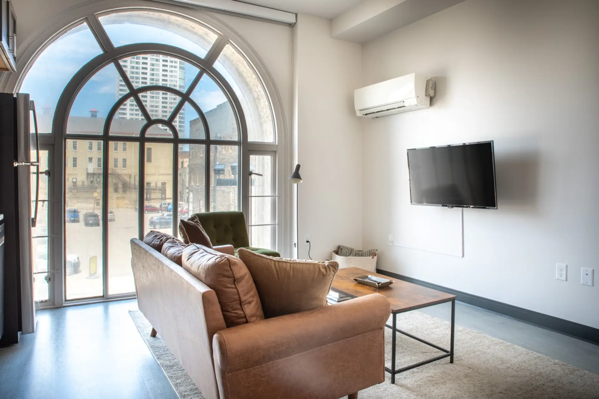 Modern comfort meets historic charm. Relax in style with stunning floor-to-ceiling views of the Deer District.