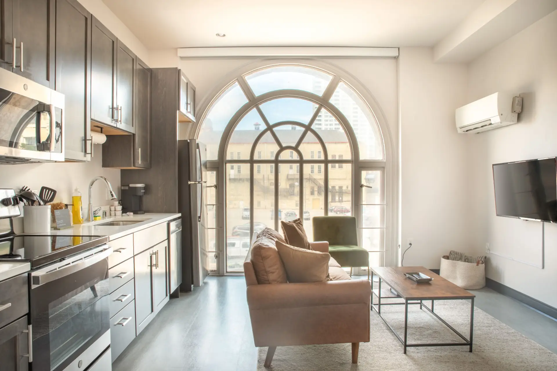 Modern comfort meets historic charm. Relax in style with stunning floor-to-ceiling views of the Deer District.