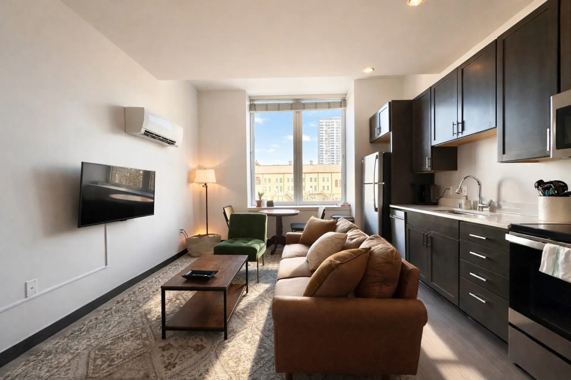 Relax or catch up on emails in this open-concept living space designed for productivity and comfort