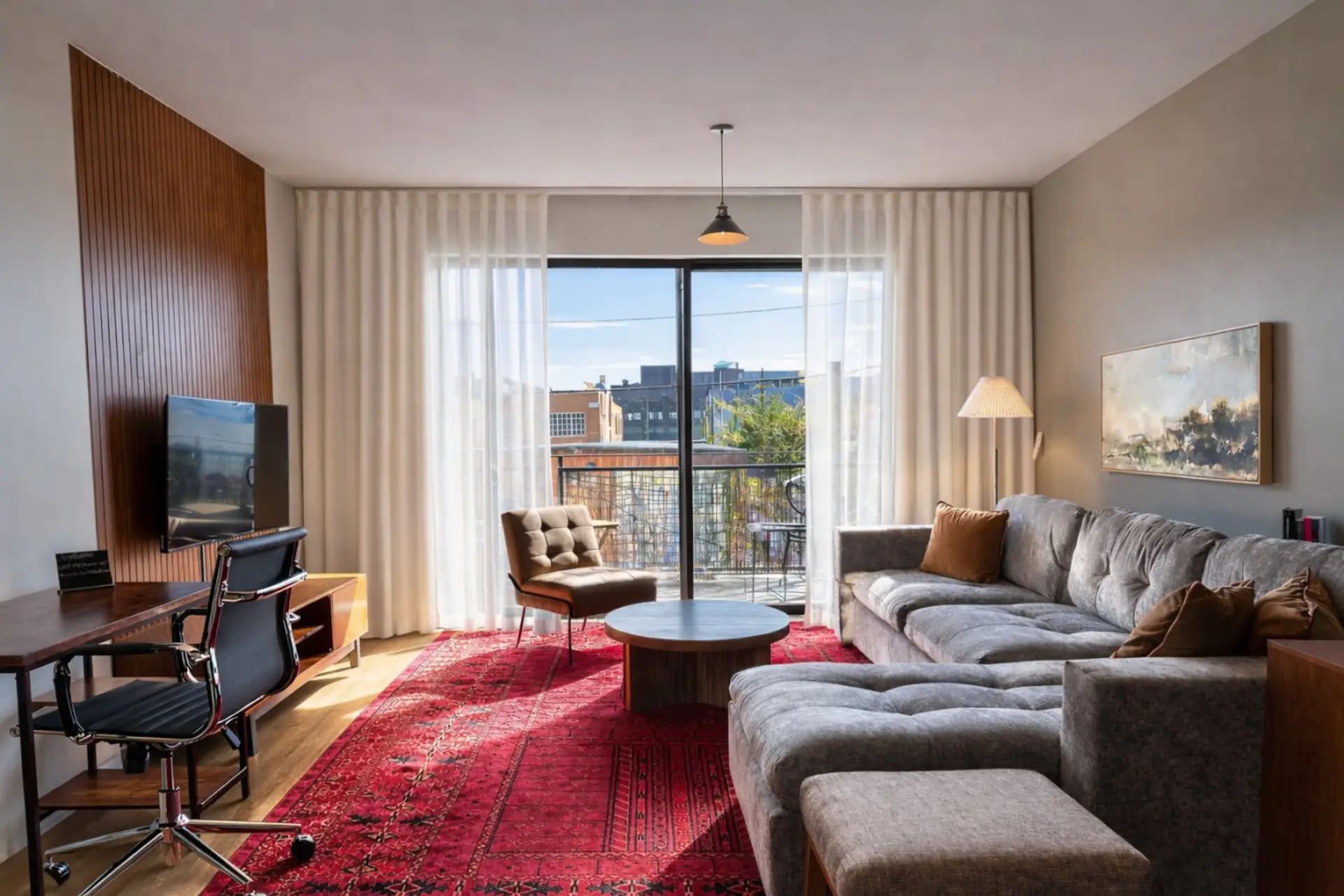 An open, light-filled space perfect for work, rest, and some fresh air on your private balcony