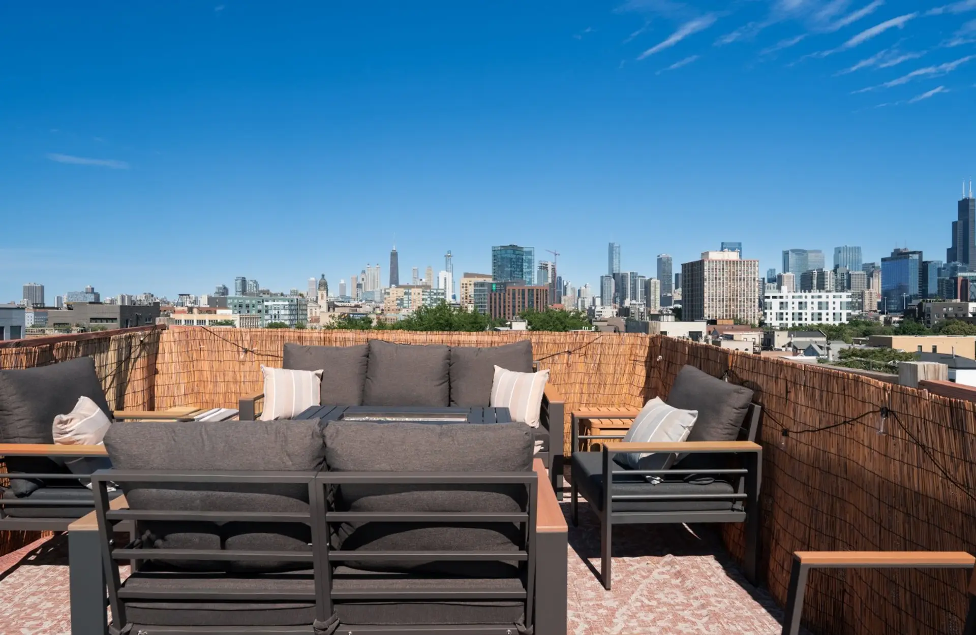 Take in the stunning Chicago skyline from your private roof deck, complete with a lounge and fire pit plus a grill and dining table