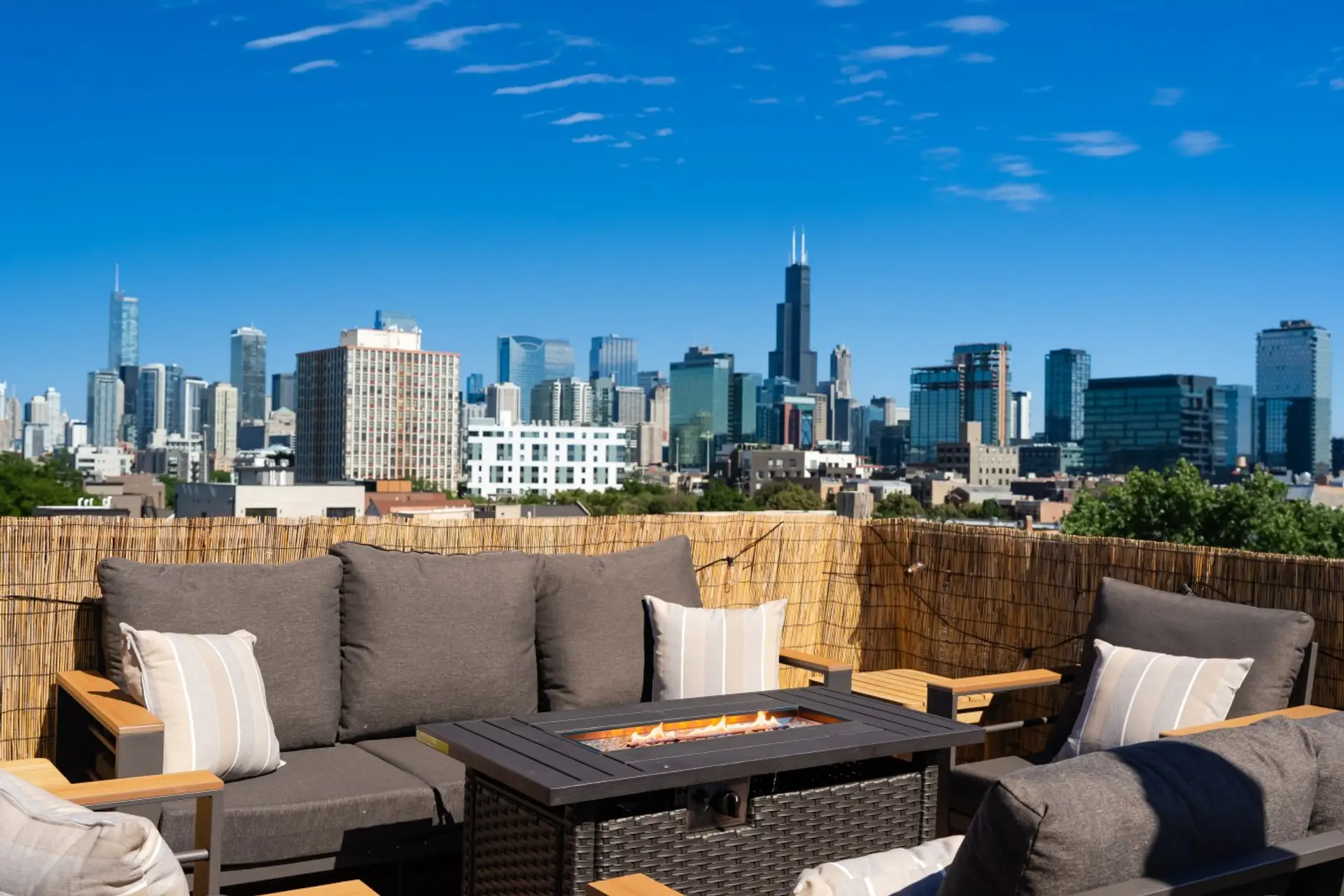 Take in the stunning Chicago skyline from your private roof deck, complete with a lounge and fire pit plus a grill and dining table