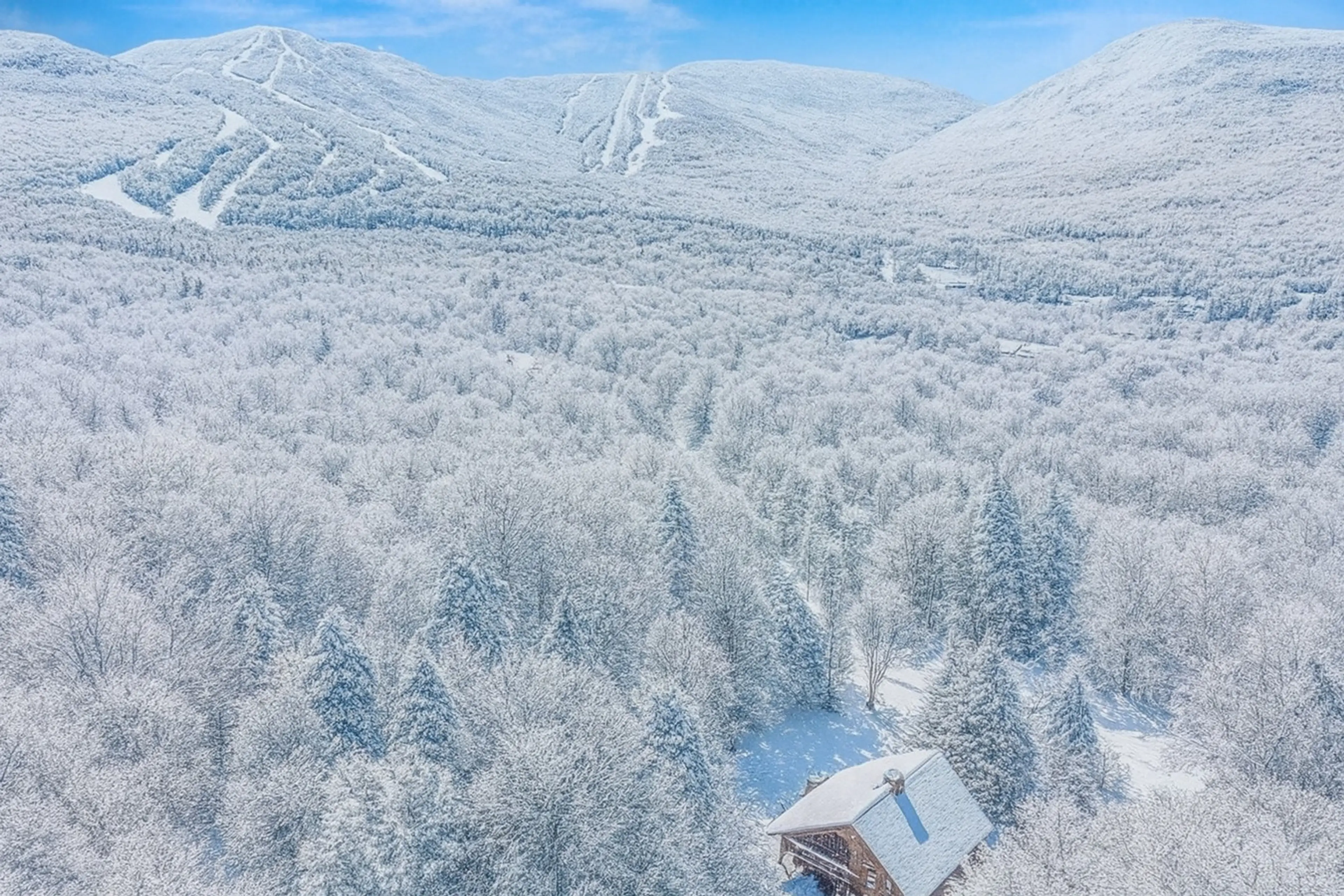 Smugglers Trove overhead with view of Smugglers Notch Ski Resort