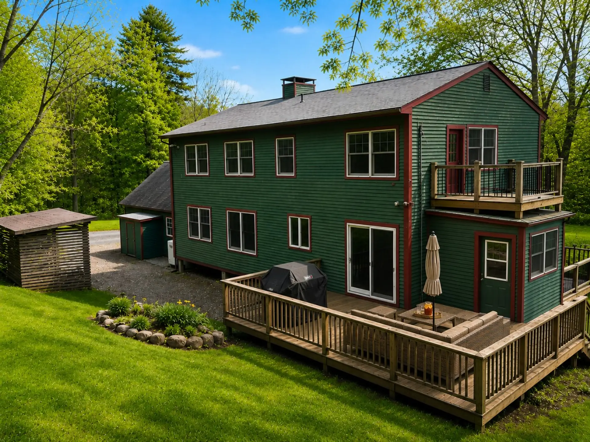 Relax on the spacious deck, fire up the grill, and enjoy peaceful woodland views surrounded by Vermont's natural beauty