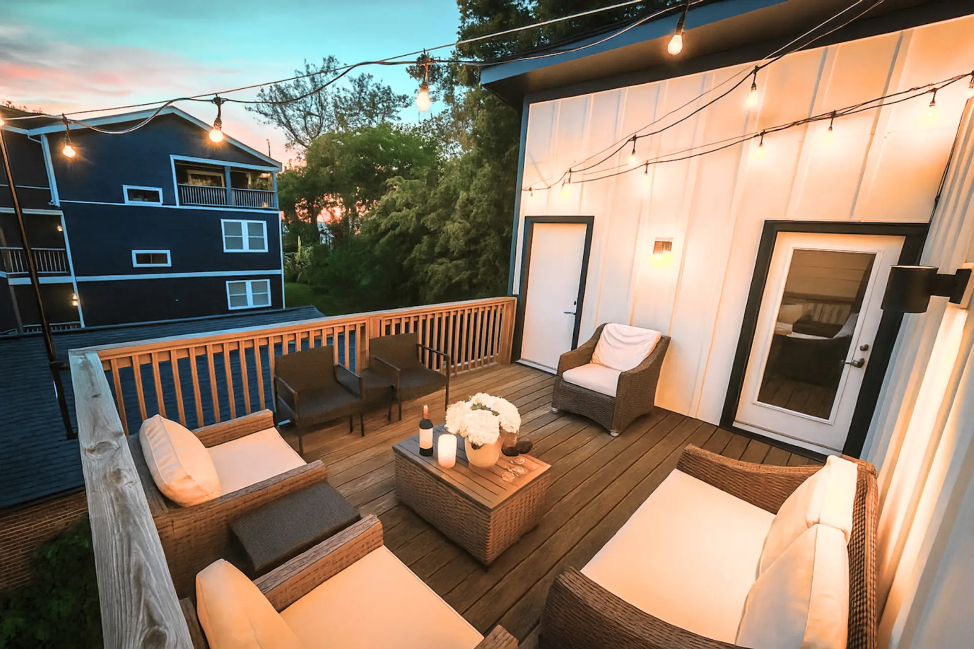 The private back deck with comfortable chairs and candles is a perfect spot for Nashville evenings.