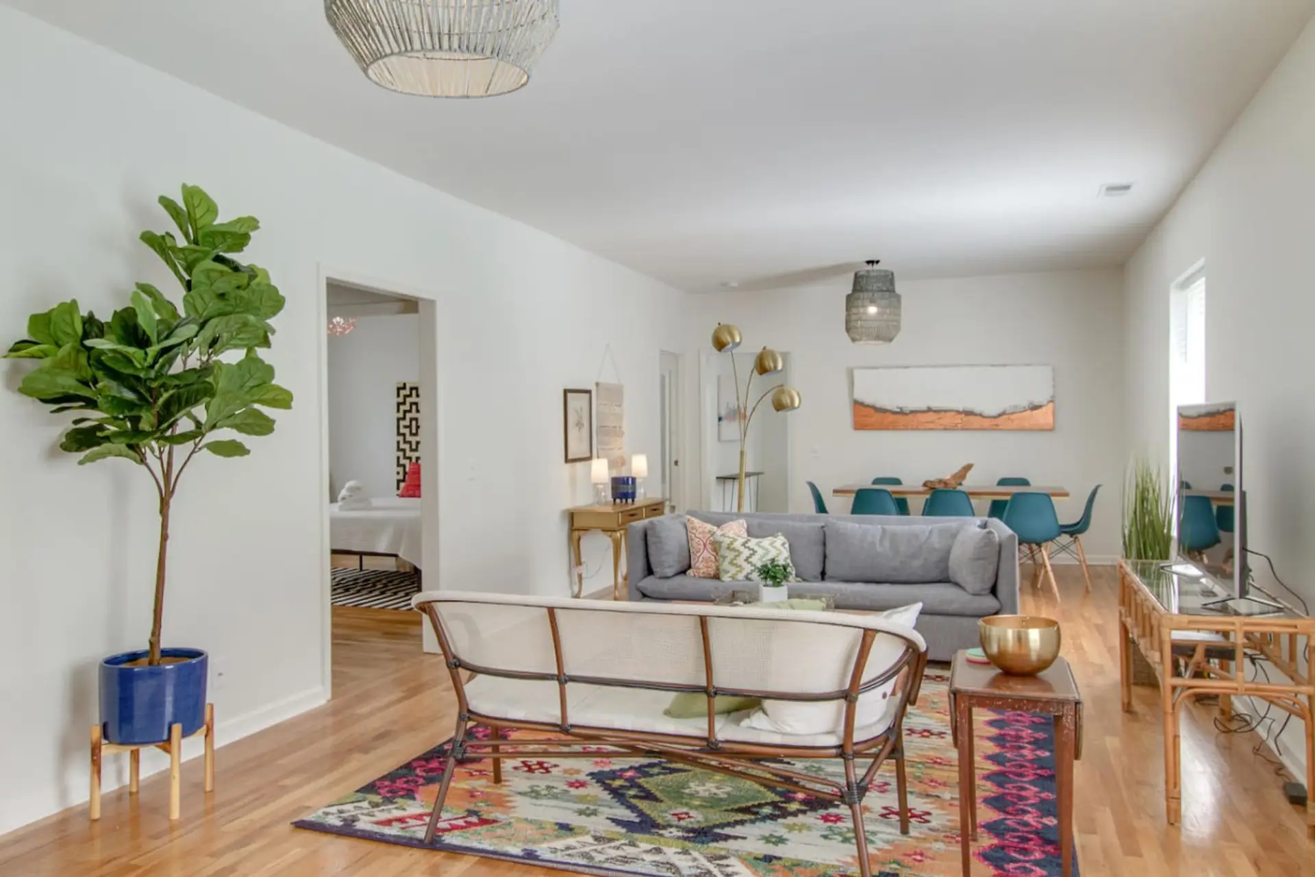 Inviting living space that opens to the dining area, full of character.