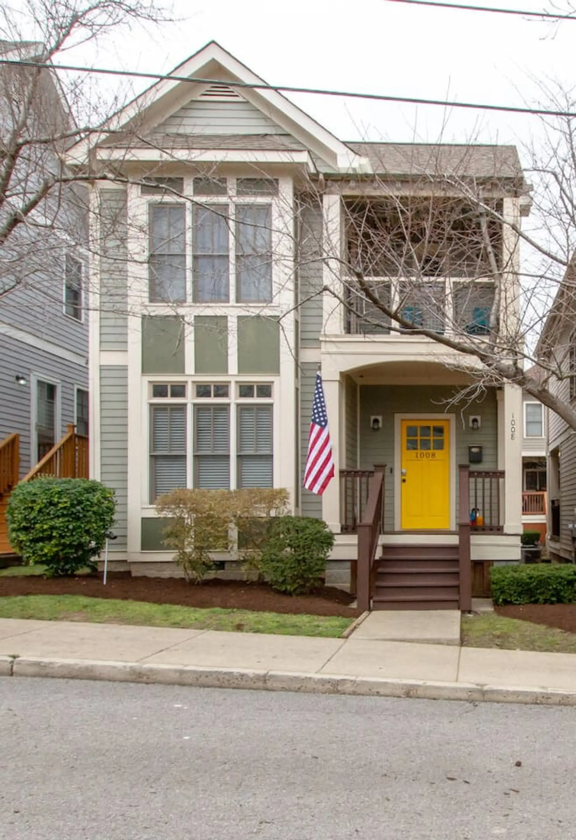 Find the cheerful yellow door that marks this Germantown gem.