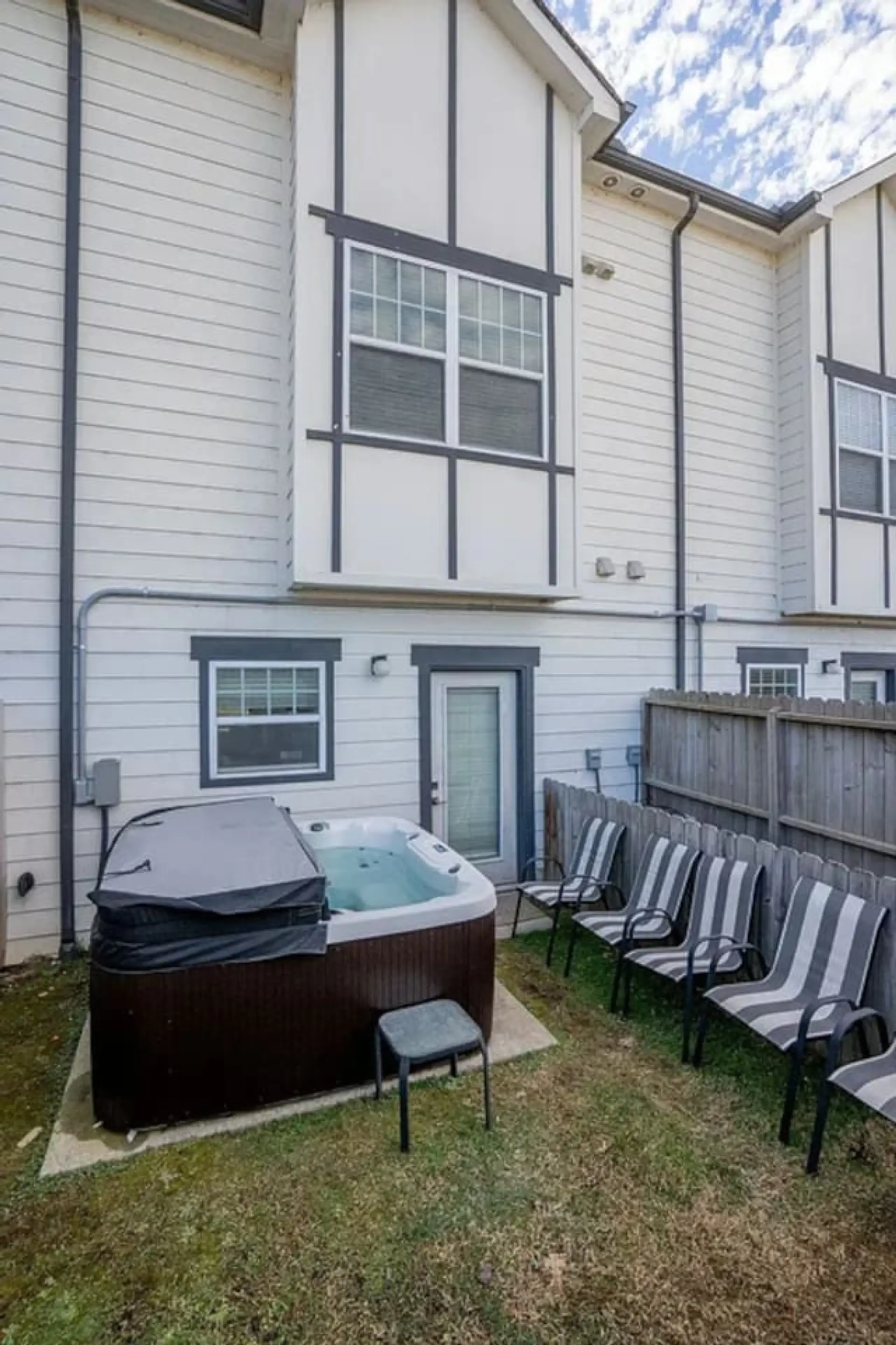 Private deck with hot tub and outdoor seating