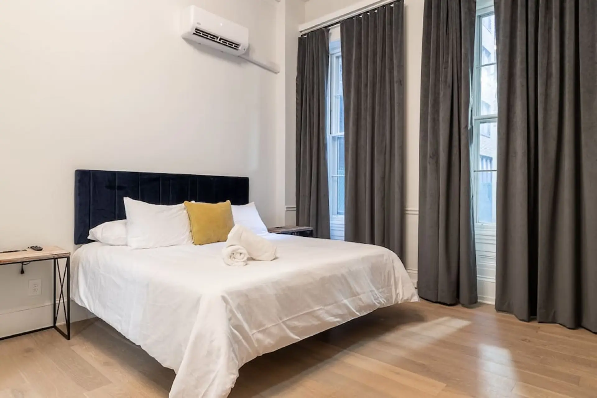 Elegant Bedroom with Air Conditioning & Storage