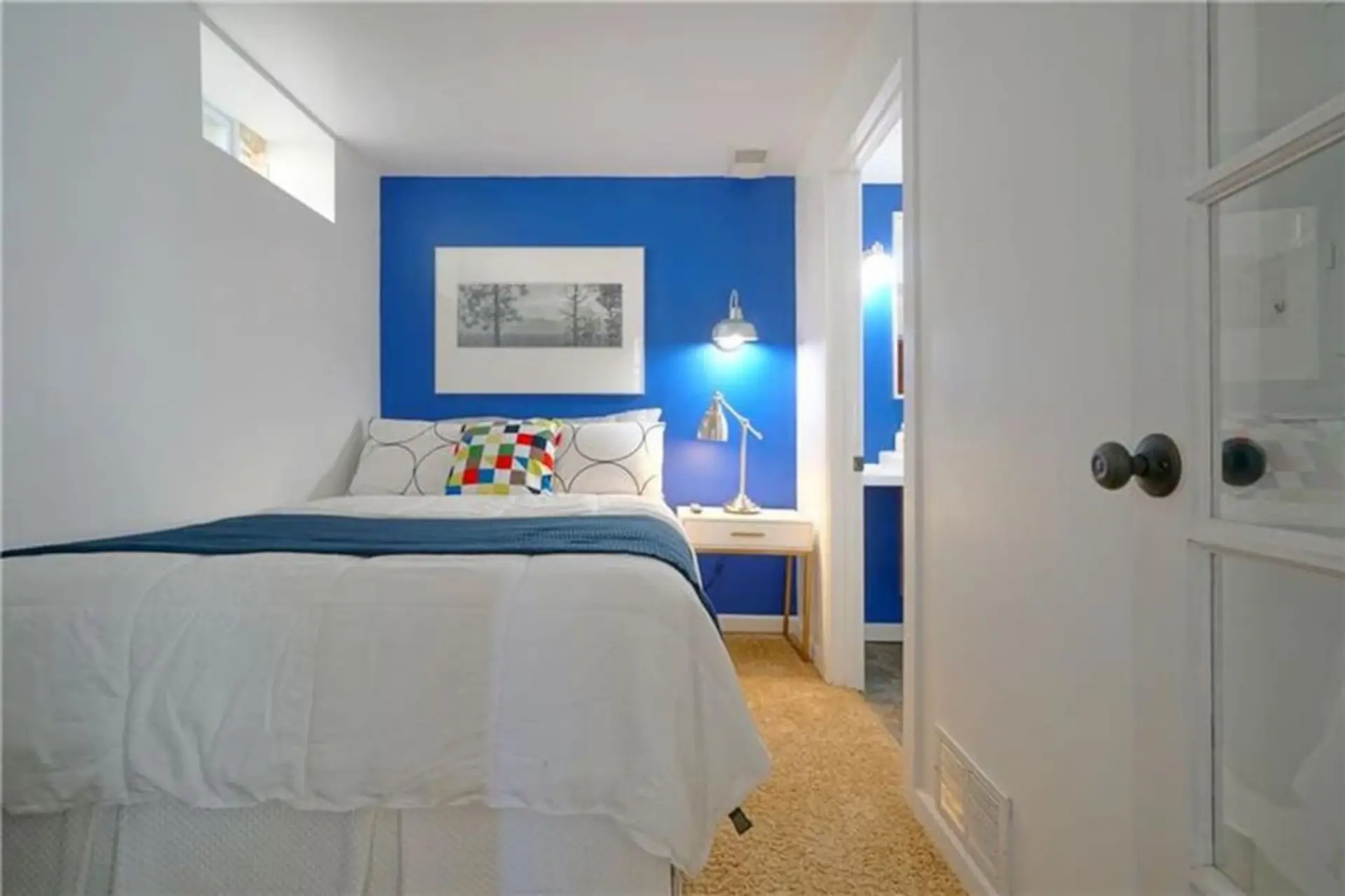 Comfortable bedroom with convenient access to the bathroom.
