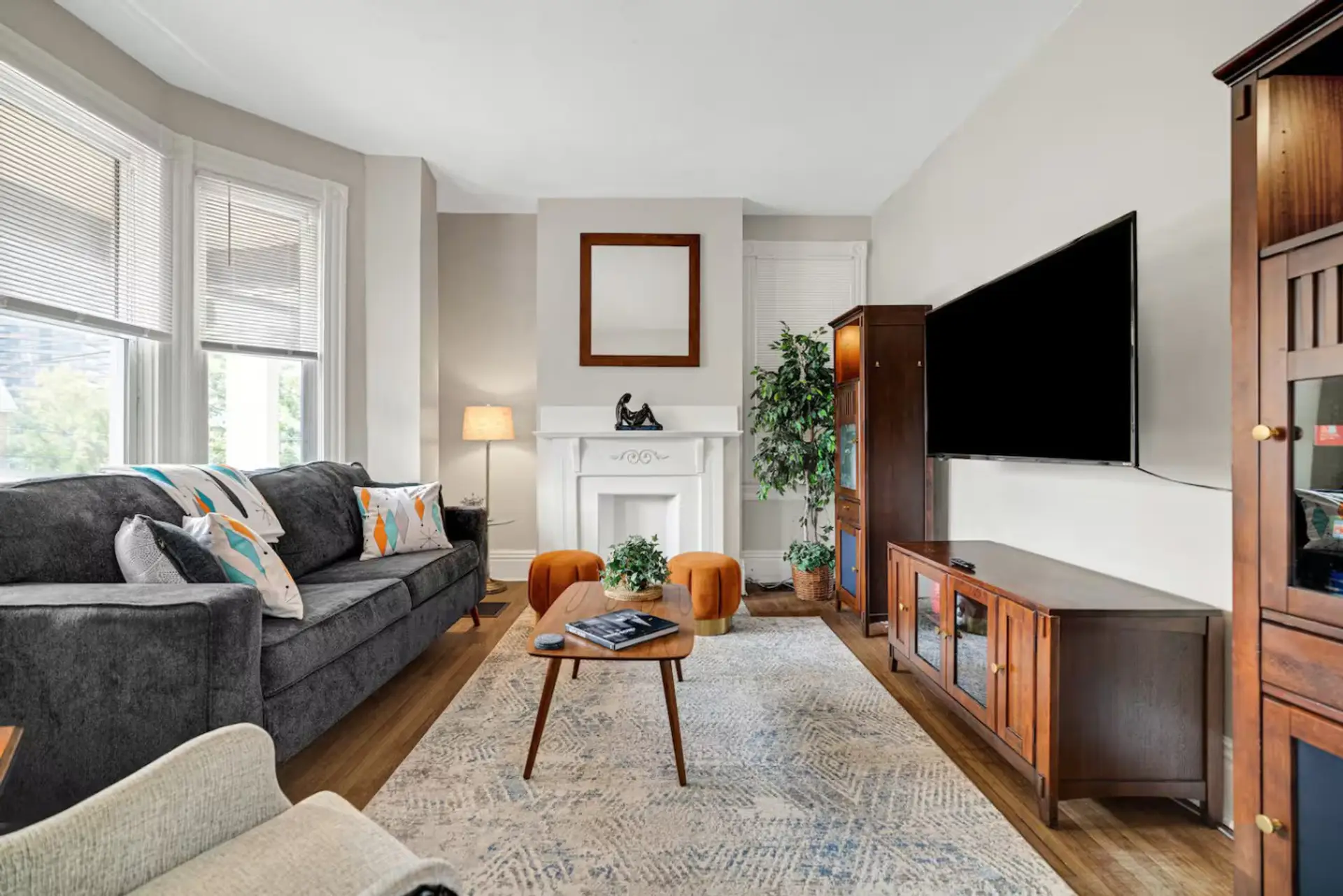 Living room with TV and comfy seating arrangement
