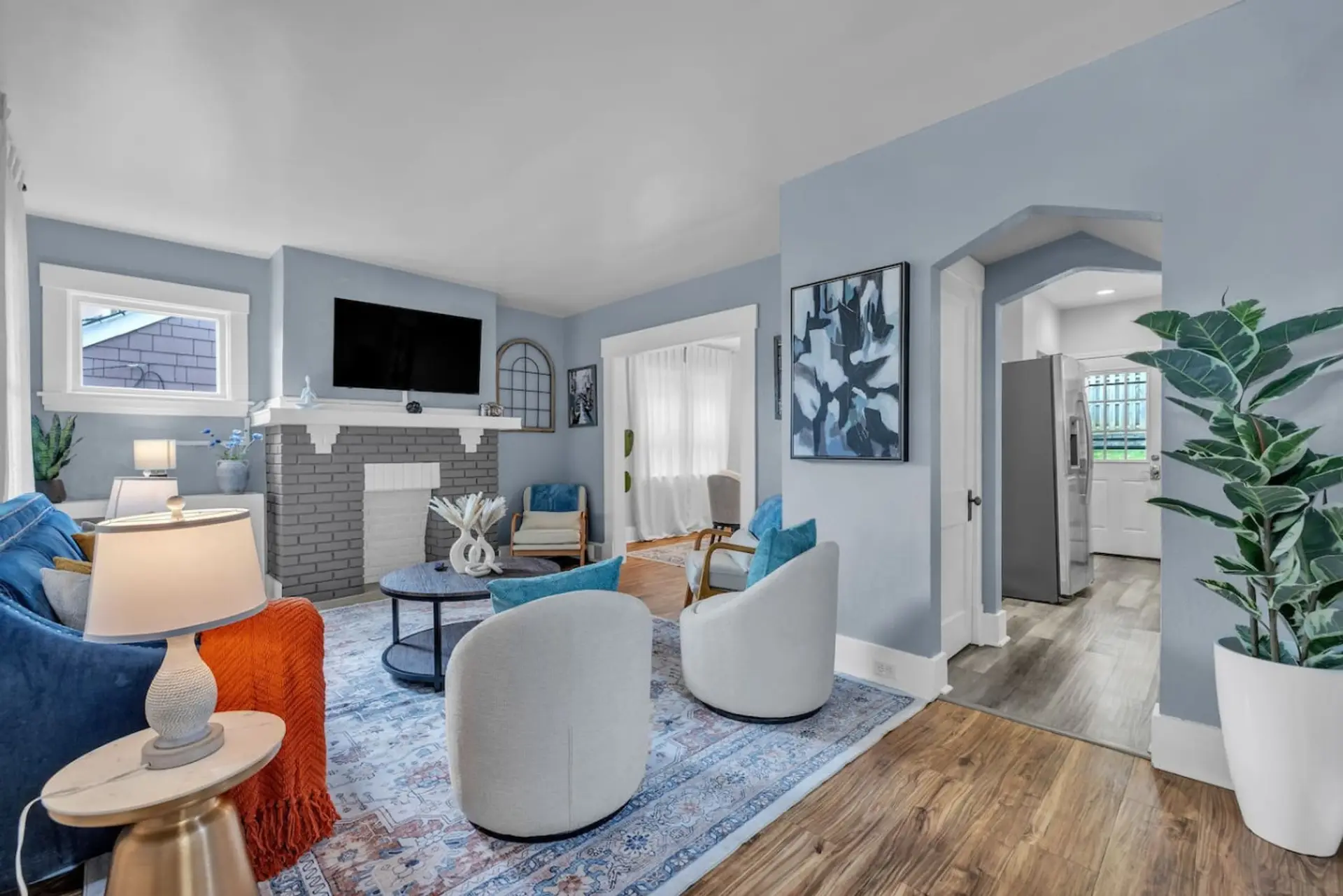 Living room with TV and comfy seating arrangement