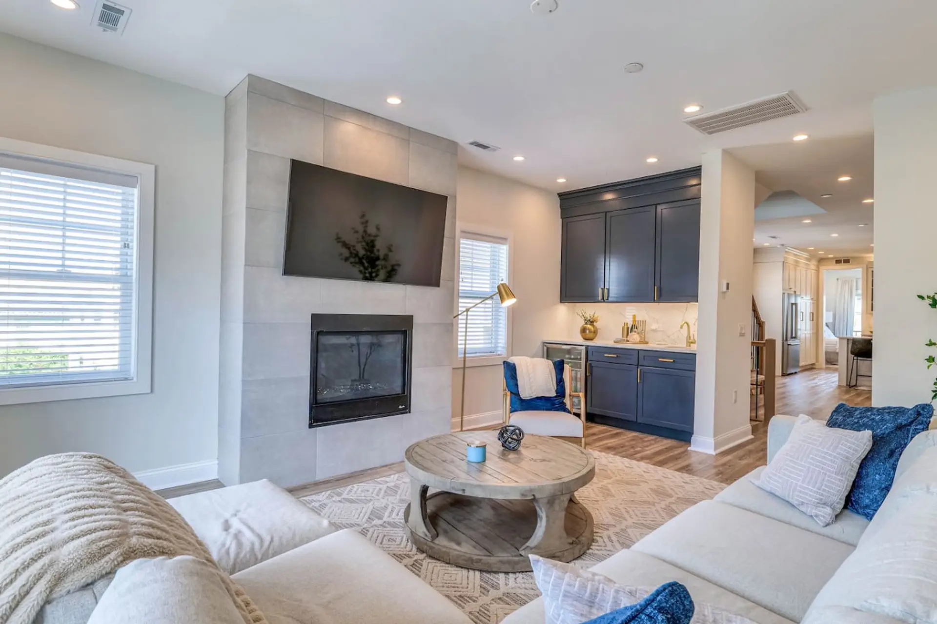 Living room with TV and comfy seating arrangement