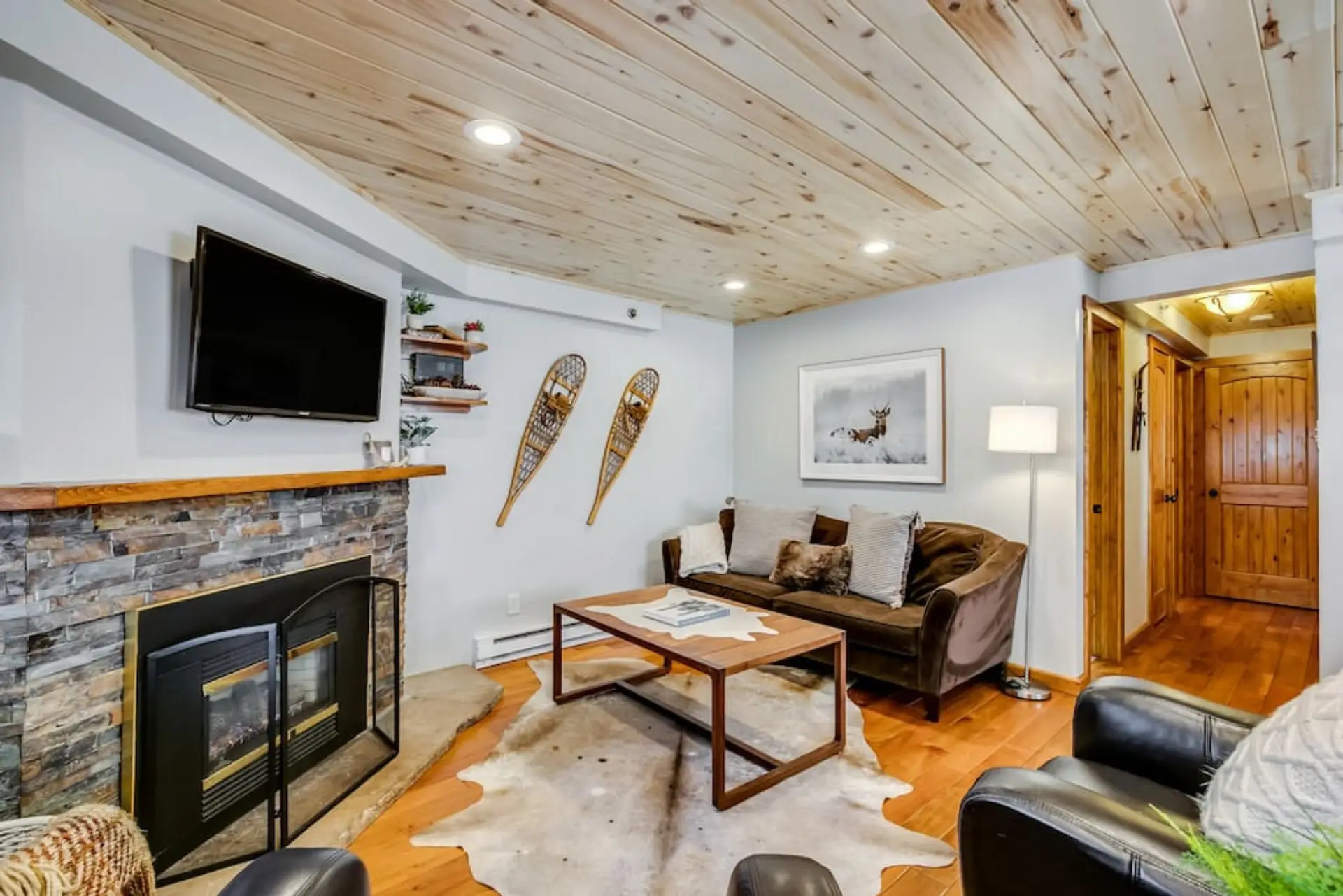 Living room w/TV and fireplace