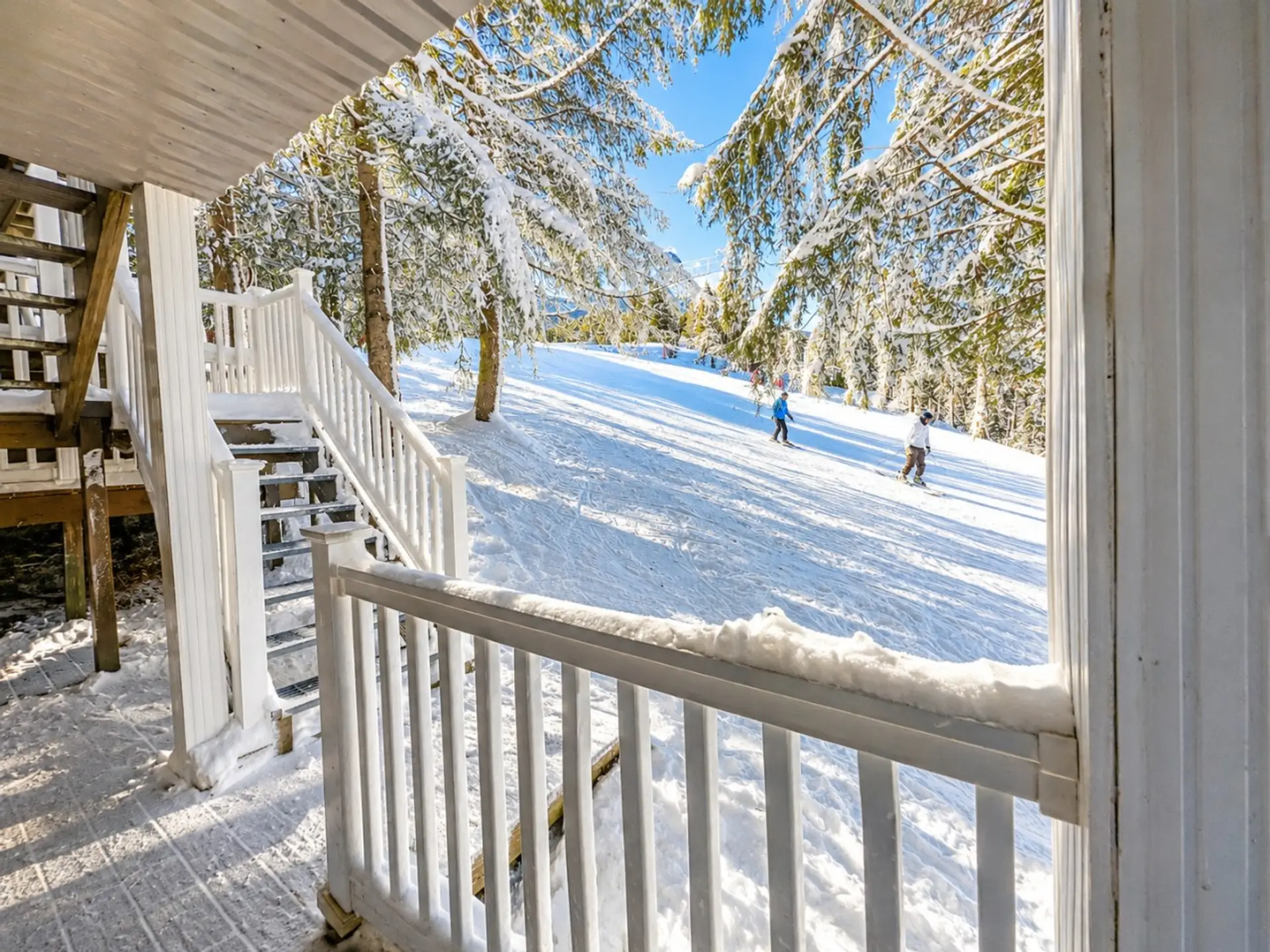 Deck leads directly to slopes!