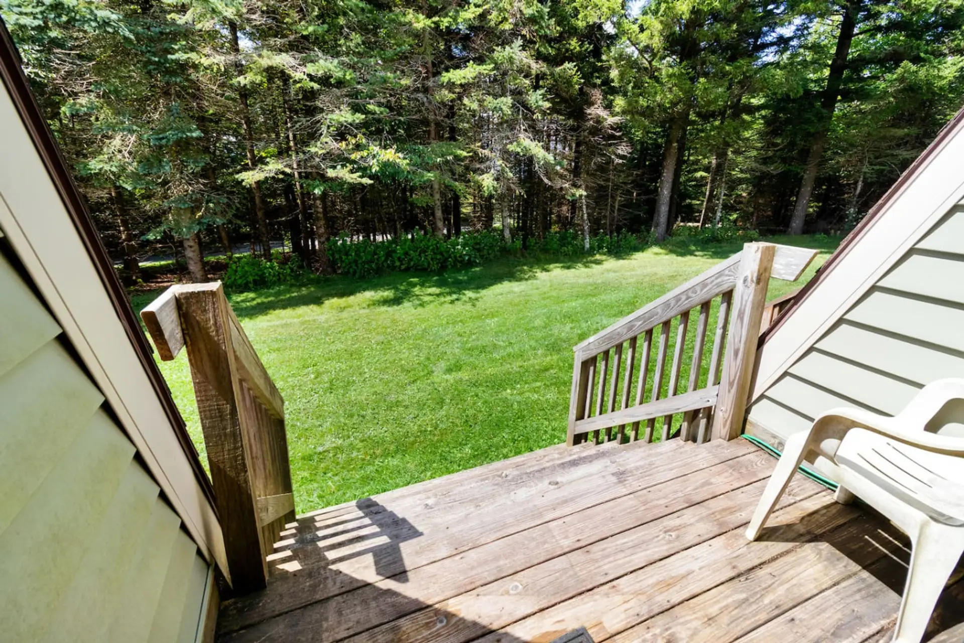 Rear exit to backyard with deck