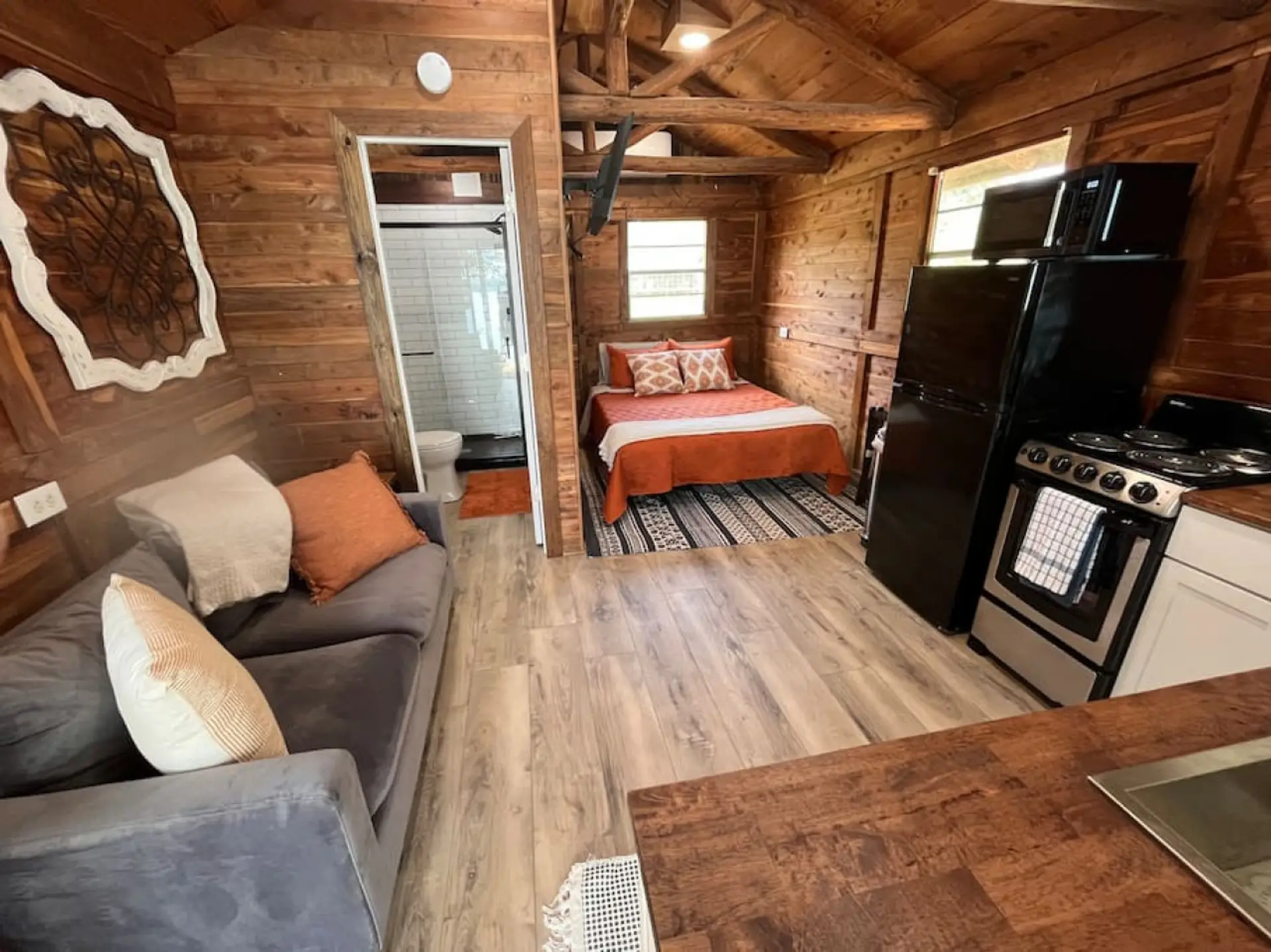 Cozy Cedar walls, living area, and kitchen.  Enjoy an amazing weekend or weeklong getaway.  All the basics to make your stay truly memorable.
