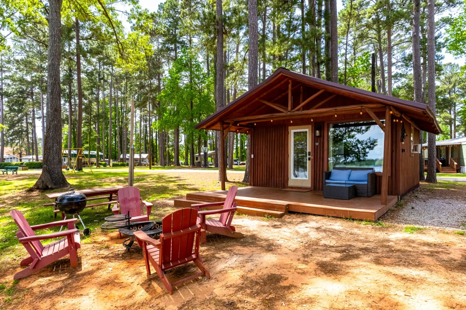 Cabin 7 Exterior view with Firepit and Grill