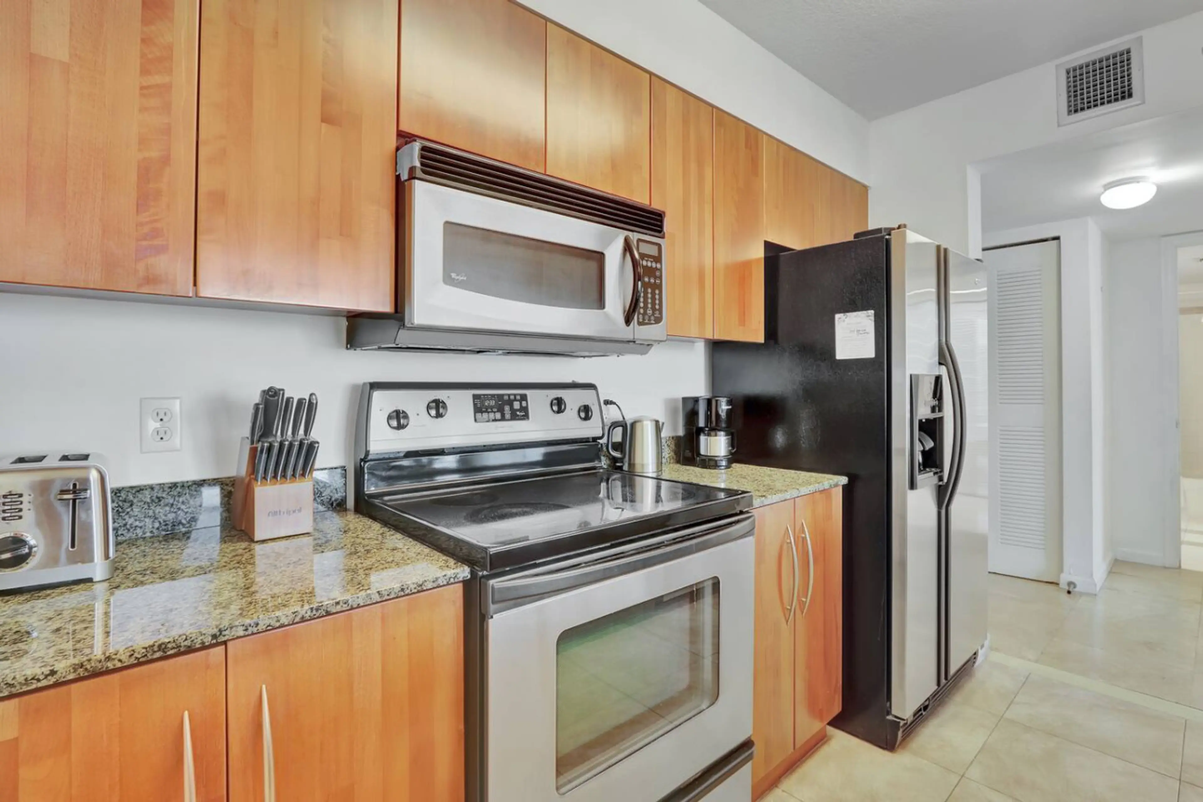 Modern kitchen equipped with all the essentials - cook, dine, and feel right at home.