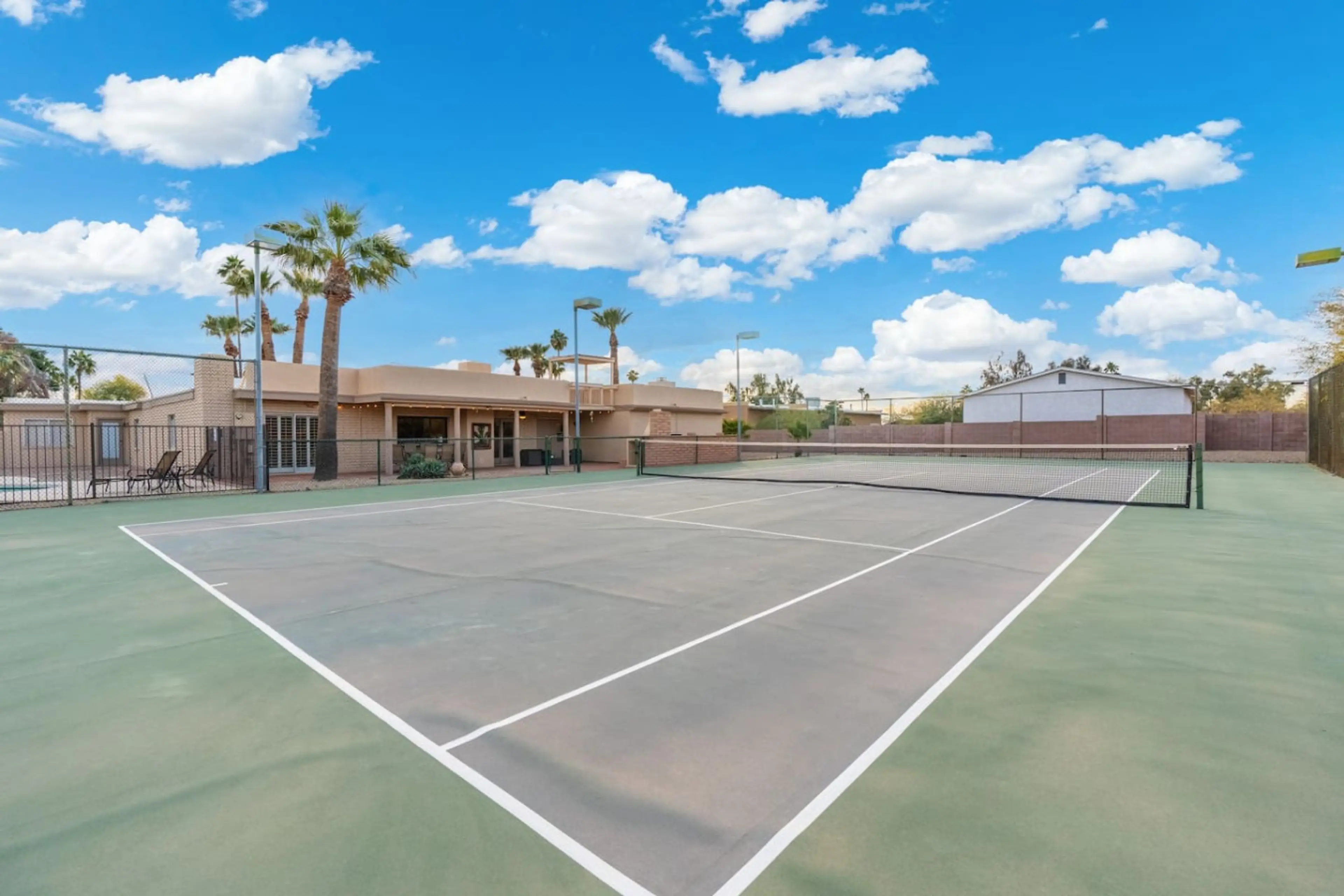 Practice your serve on the private full-size tennis court, available exclusively to guests.