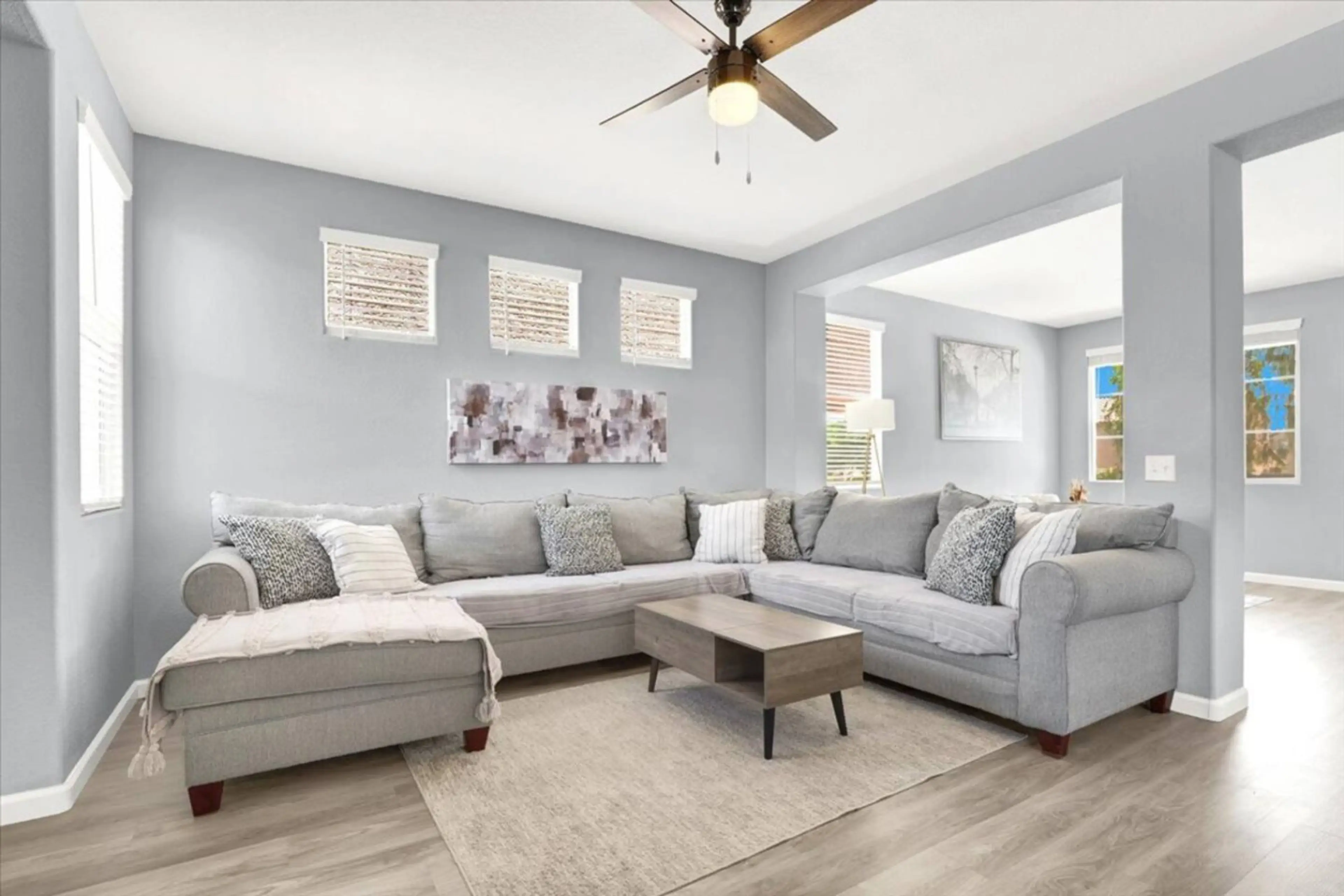 Relax and unwind in the spacious living room with plush seating and a 75” smart TV for all your streaming needs.