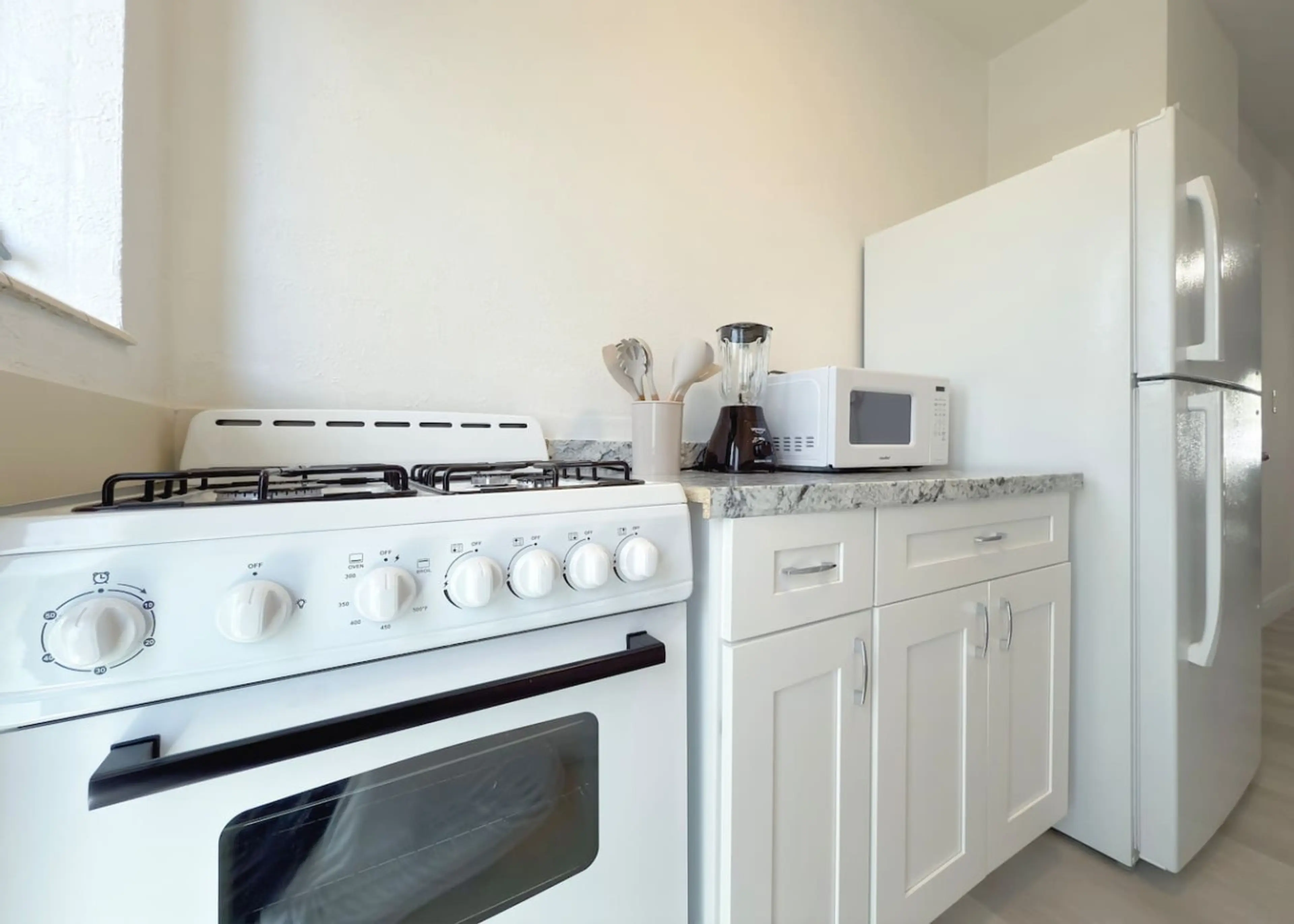 Fully equipped kitchen with modern appliances, cookware, and everything you need to whip up a quick meal or beach picnic.