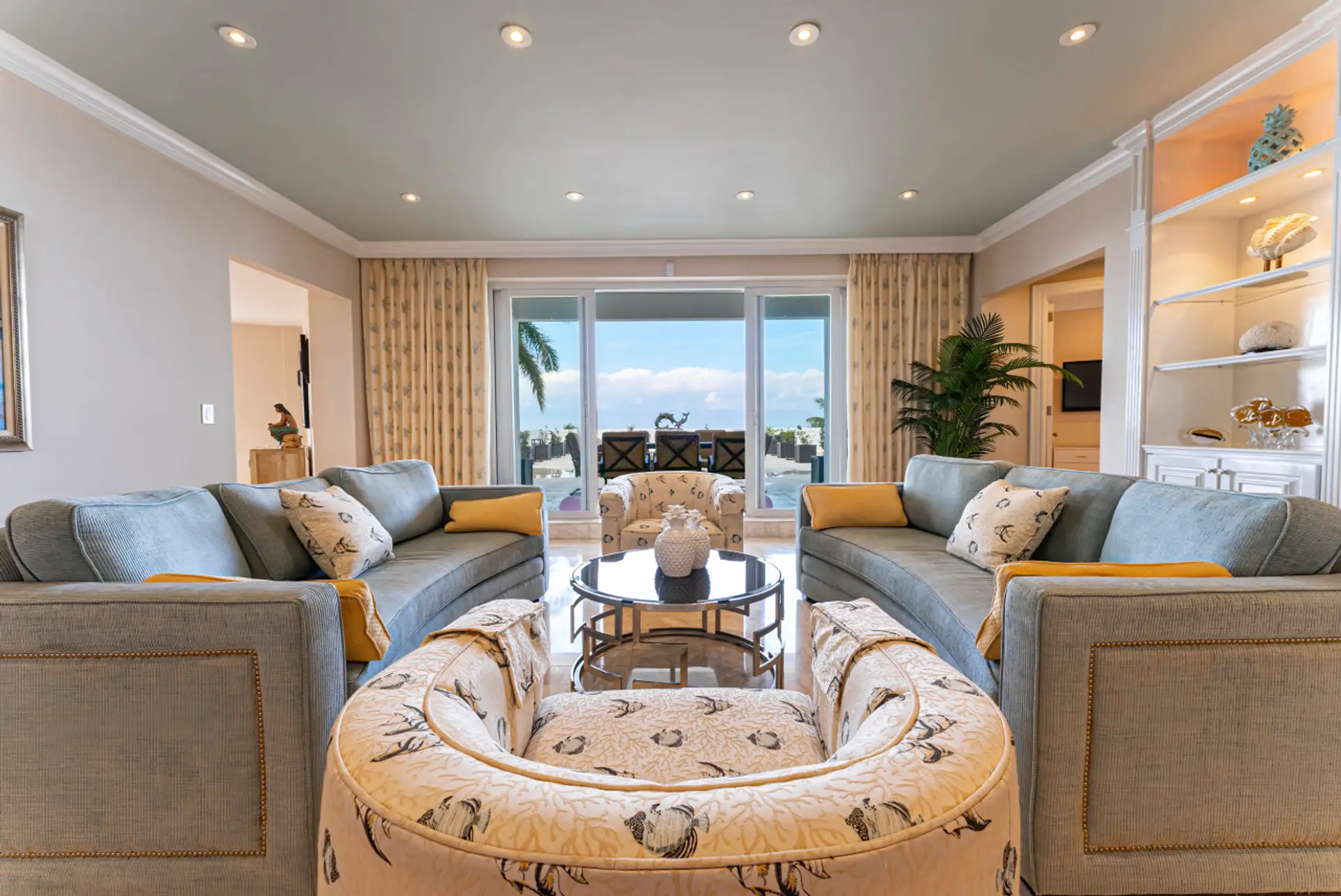 Living room w/ walk-out to 3,400 sq ft ocean view terrace