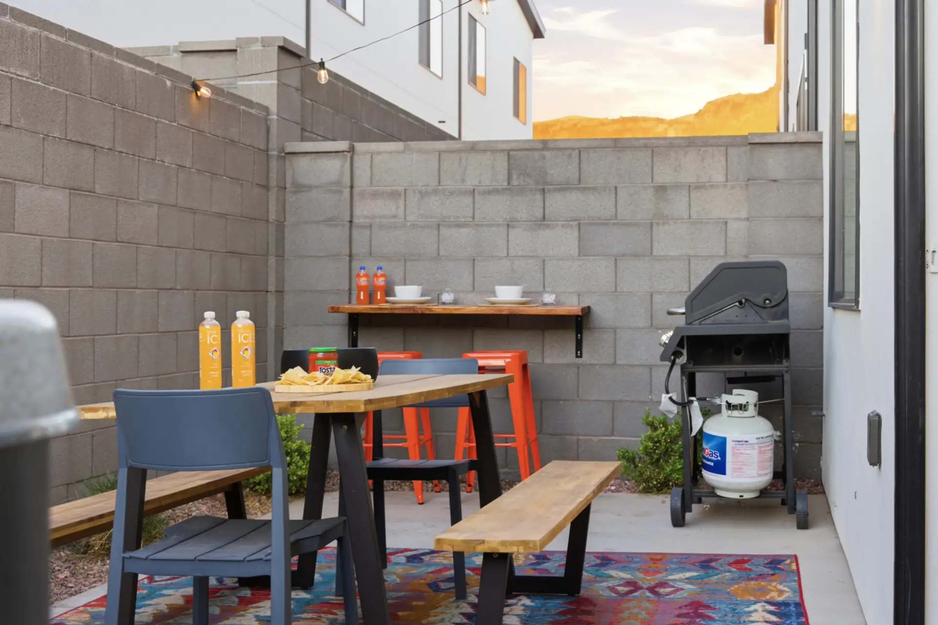 Outdoor Dining Oasis: Gather around the stylish table for meals under the stars and sunset views!