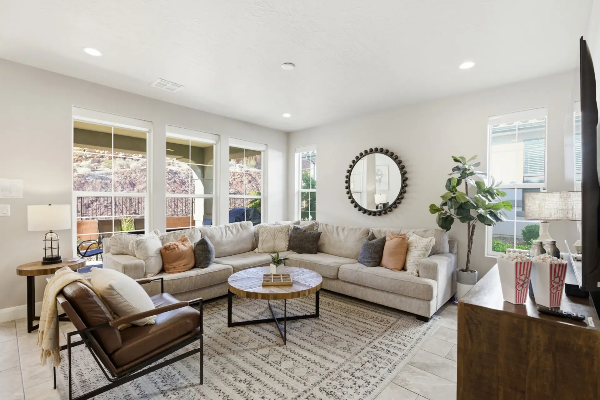 Living Room: Bright and airy, perfect for movie nights or relaxed chats with mountain views!