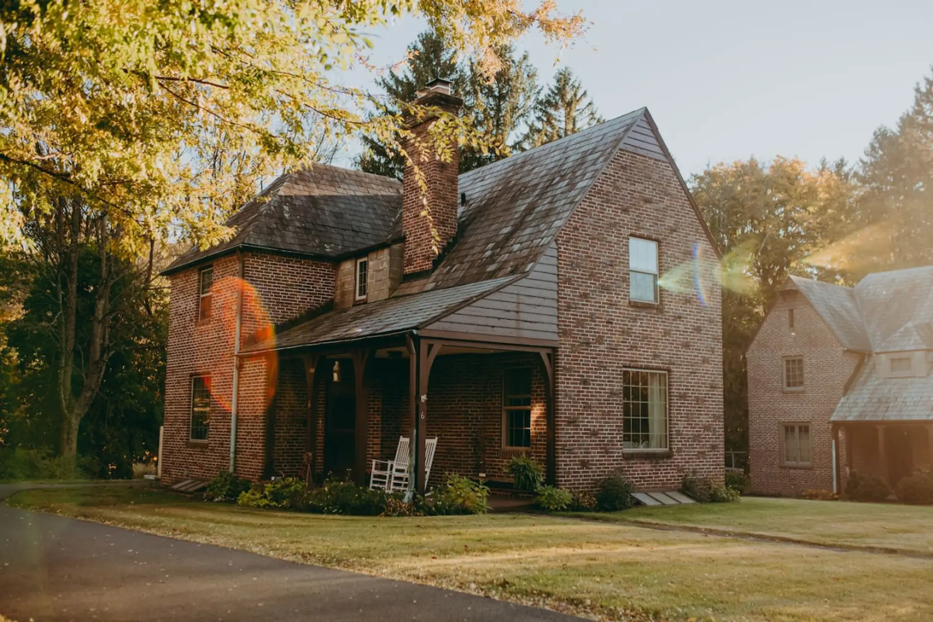 Two-story brick house with a covered front porch