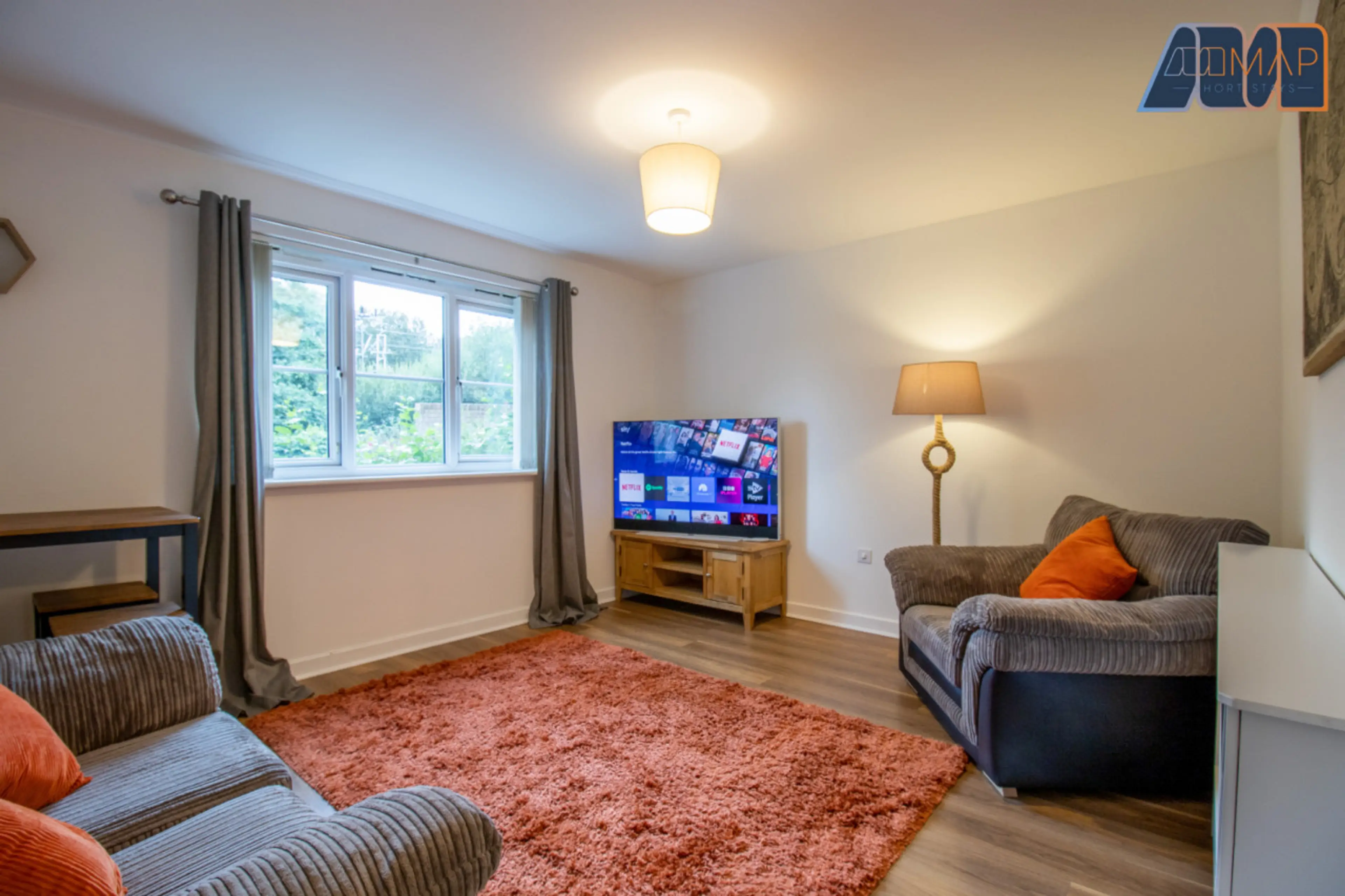 Unwind in style with a view and your favorite shows.