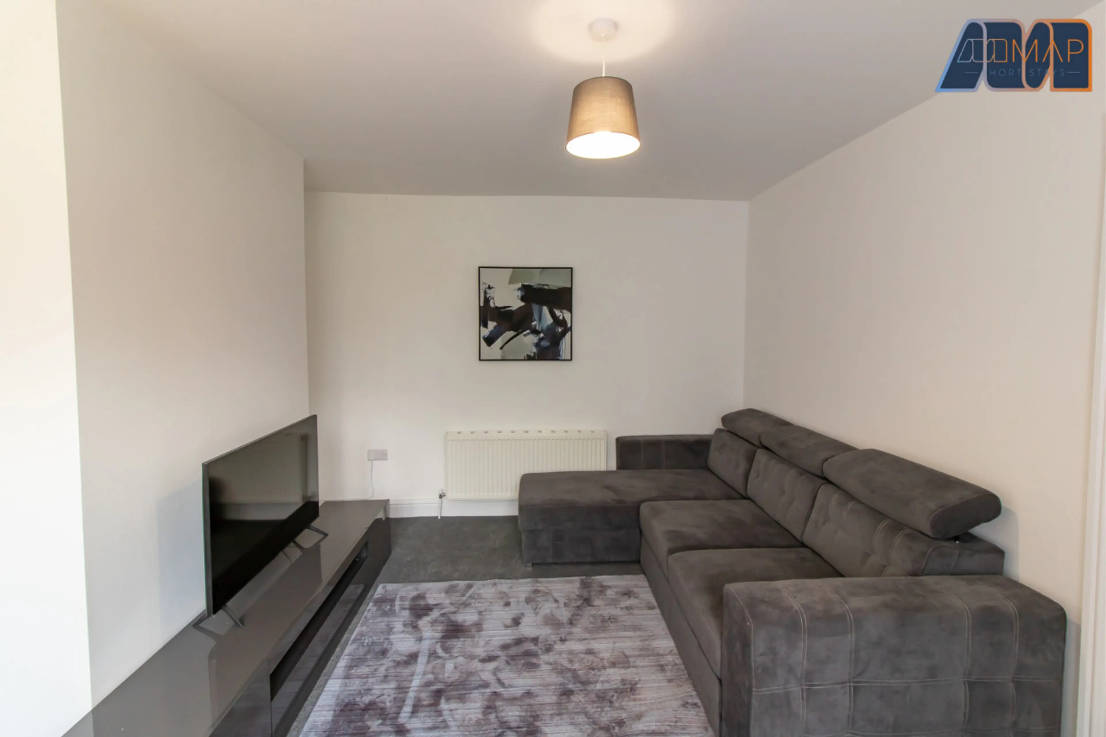 Clean, minimalist living room – a calm and stylish space designed for relaxation and comfort.