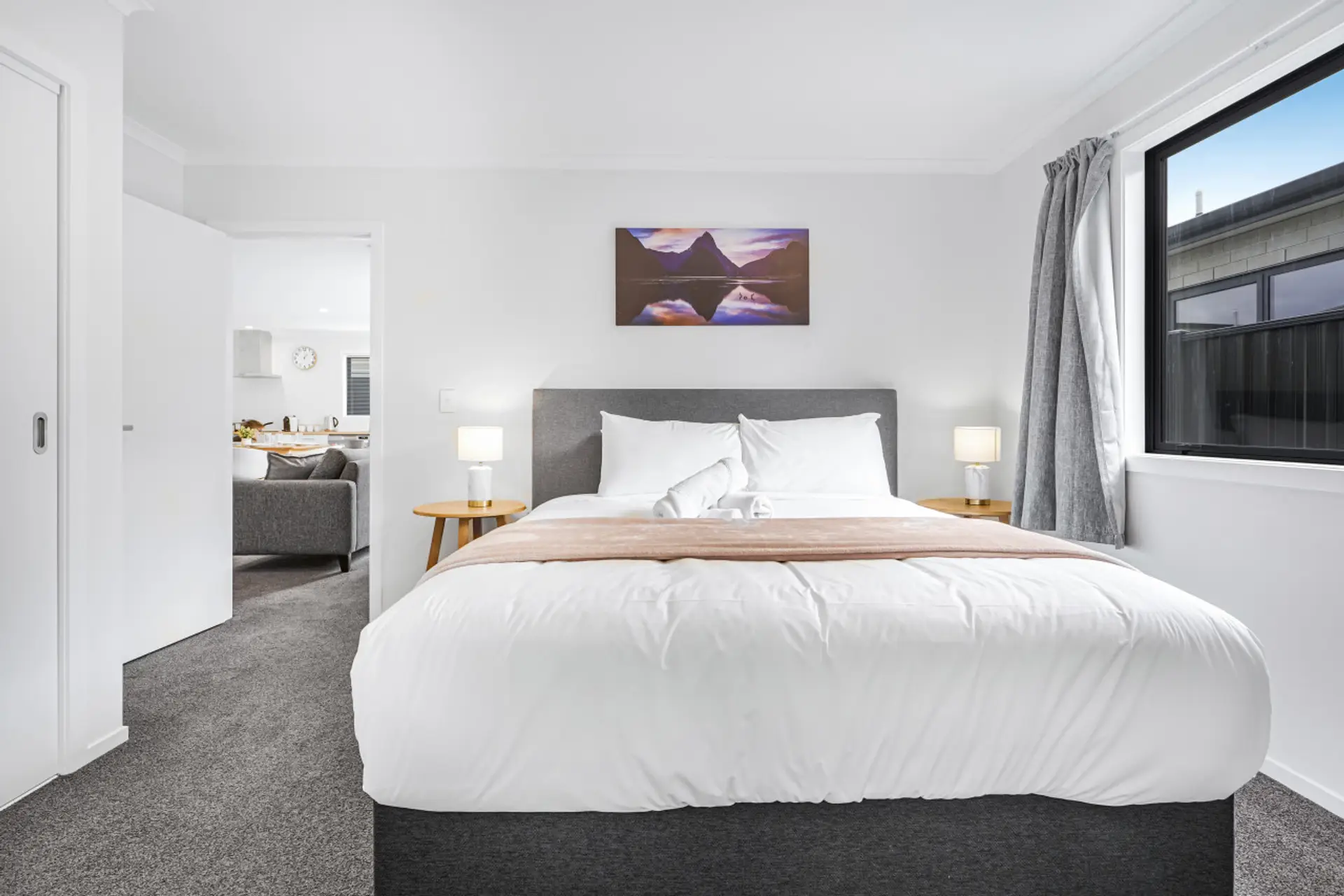 Bedroom 1: A large room with dreamy king bed and modern, private ensuite.