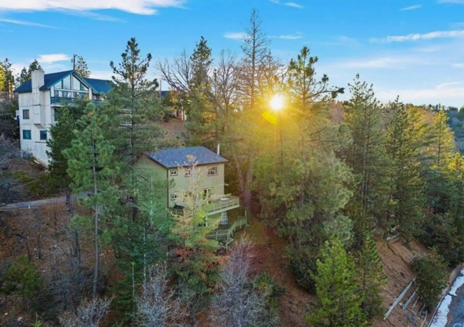 Deer Crest Lodge in Lake Arrowhead secluded in your own tree lined sanctuary with spectacular views of the forest, sunsets and just a stunning area to wake up to.