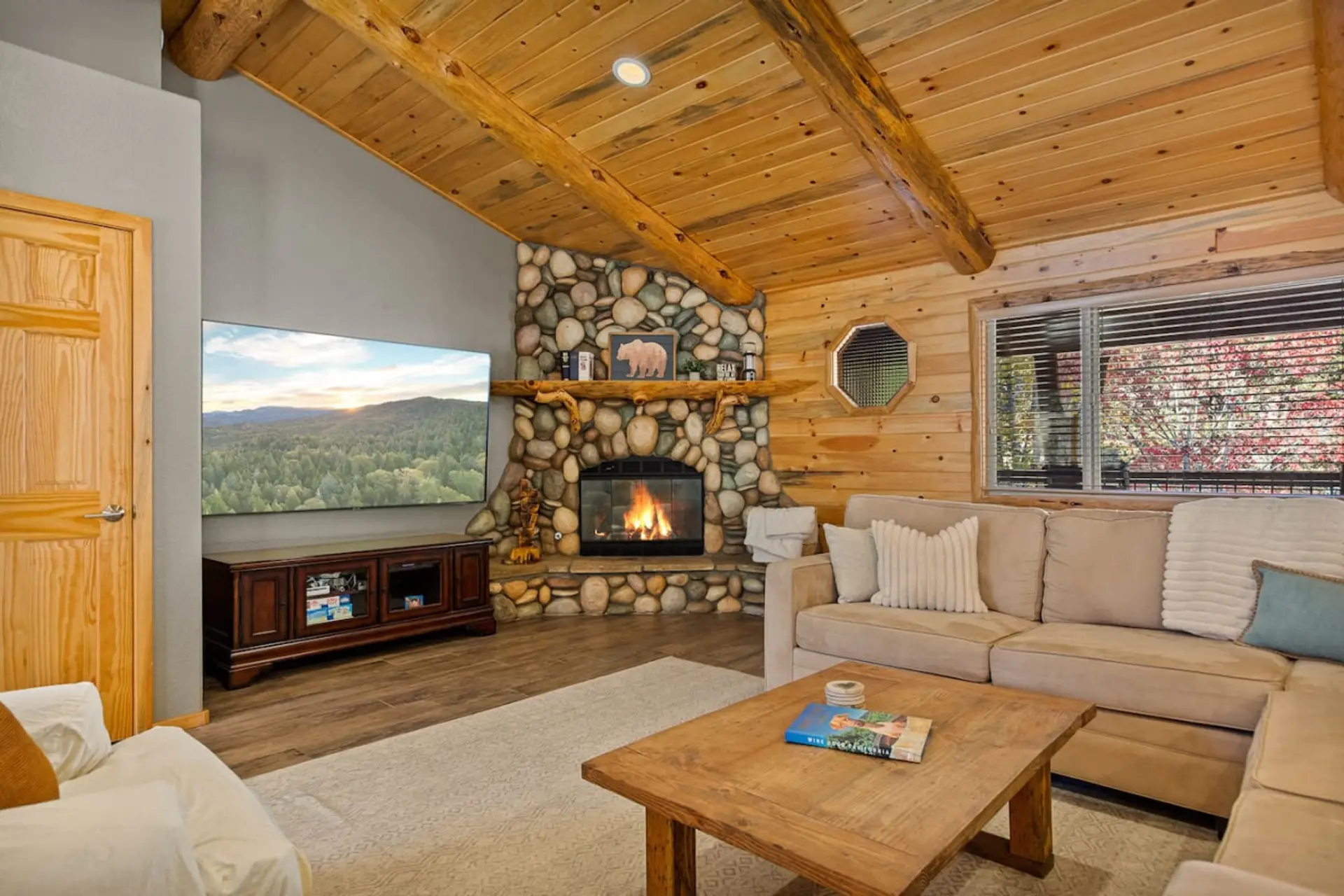 A beautiful rock gas fireplace is the focal point in the main living area providing warmth and charm.
