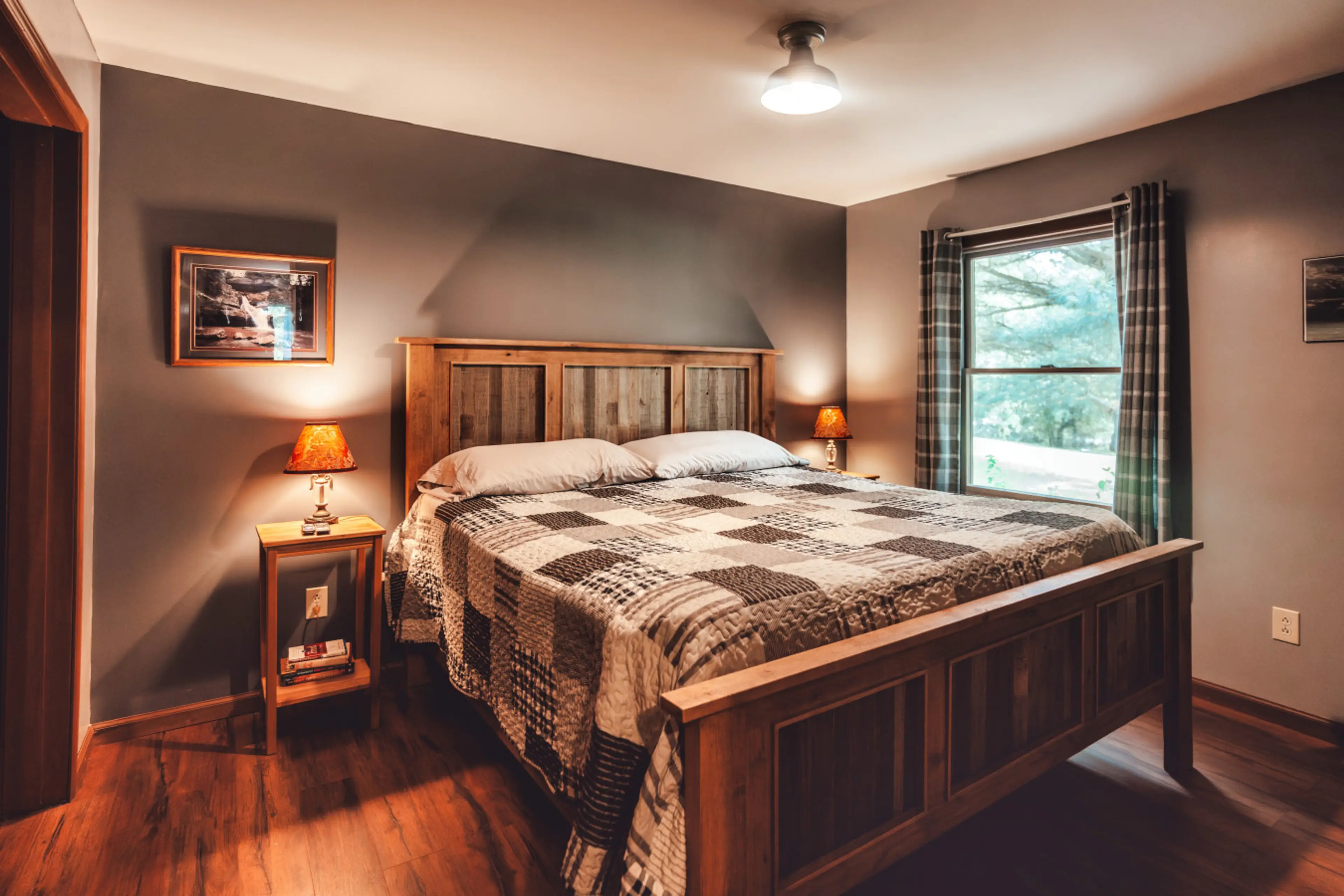 The master bedroom is fitted with a king bed and fresh soft linens.