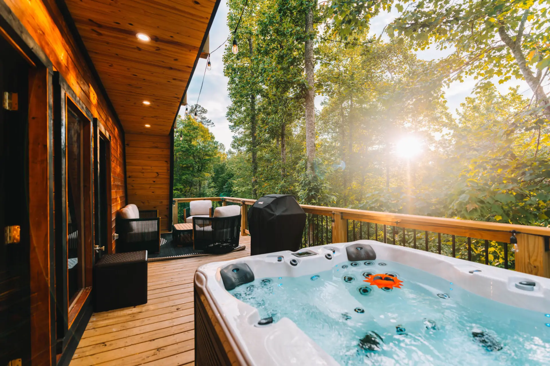 Soak under the stars in a private hot tub overlooking the Kentucky woods