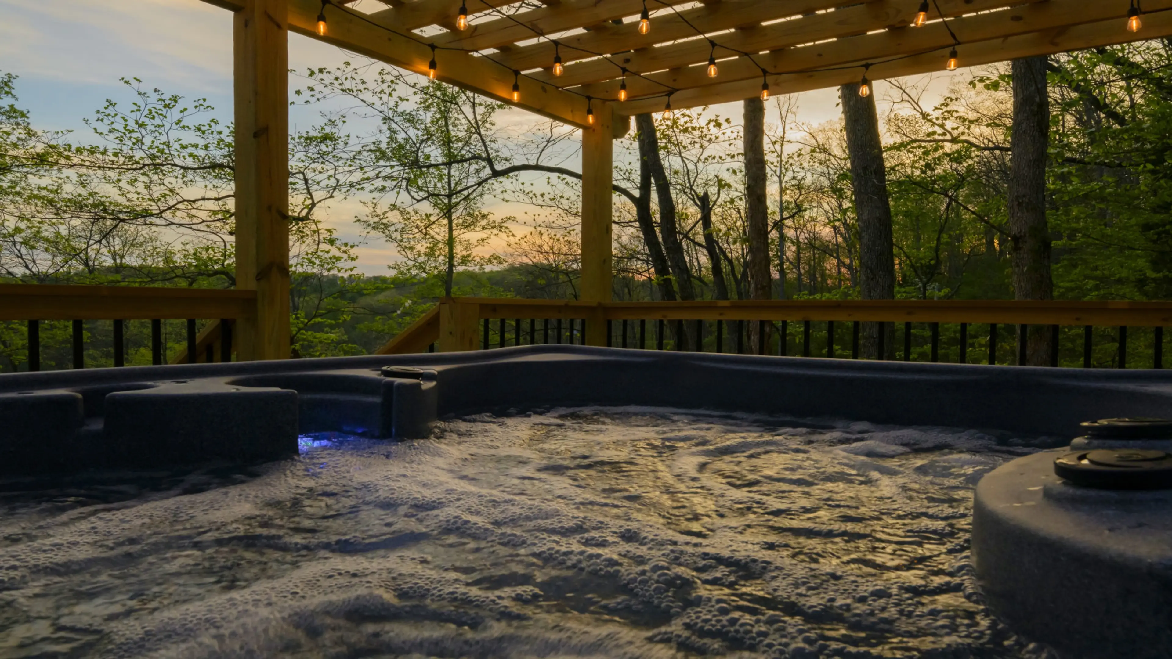 Soak under the stars in your private hot tub — a Red River Gorge couples' retreat