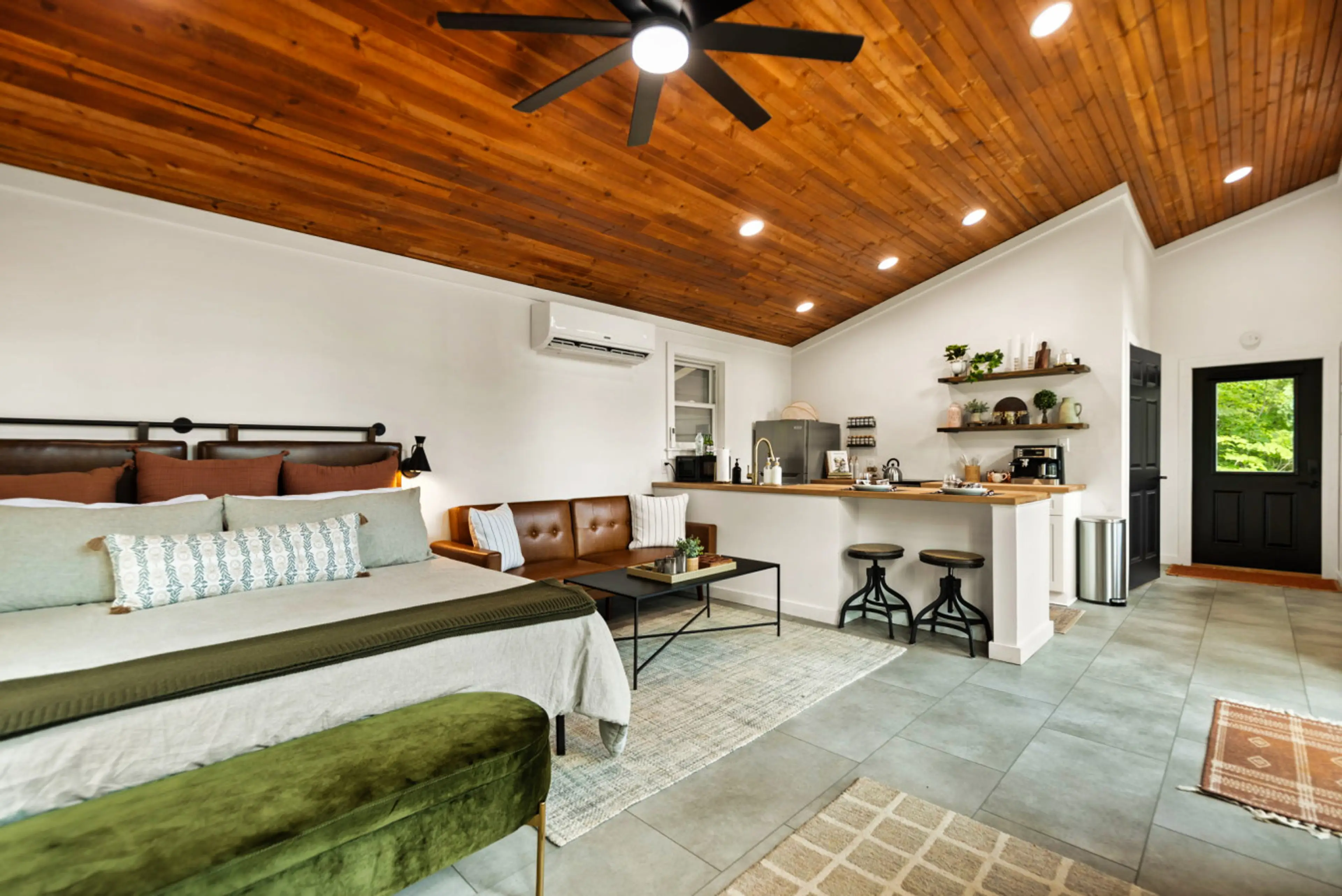 The cabin's open layout concept connected to the kitchen and kitchen island