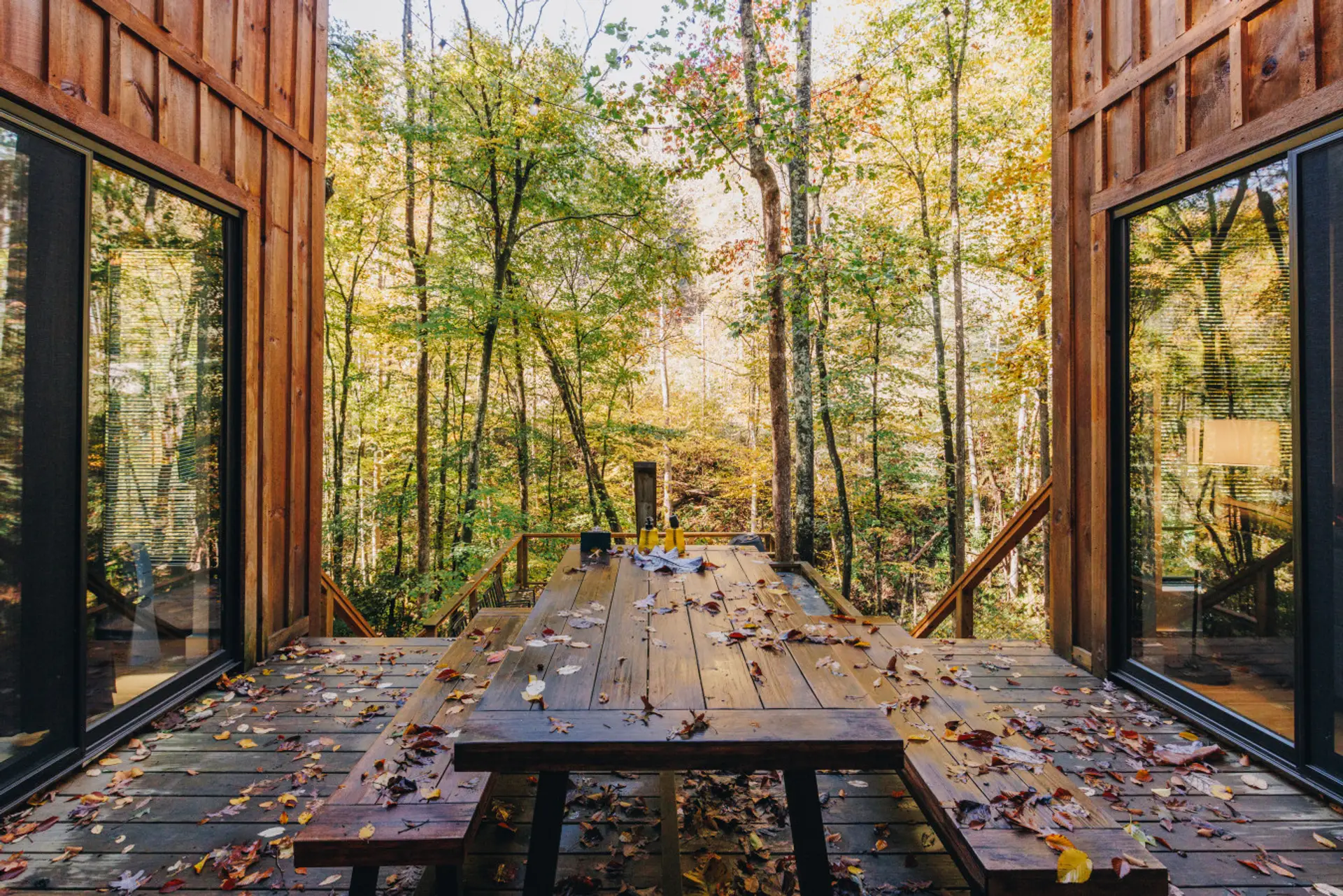 Step outside to your private deck, where meals feel better with fresh forest air. Share stories around the picnic-style table, then slip down to the bubbling hot tub just steps away—perfect for ending the day under the stars.