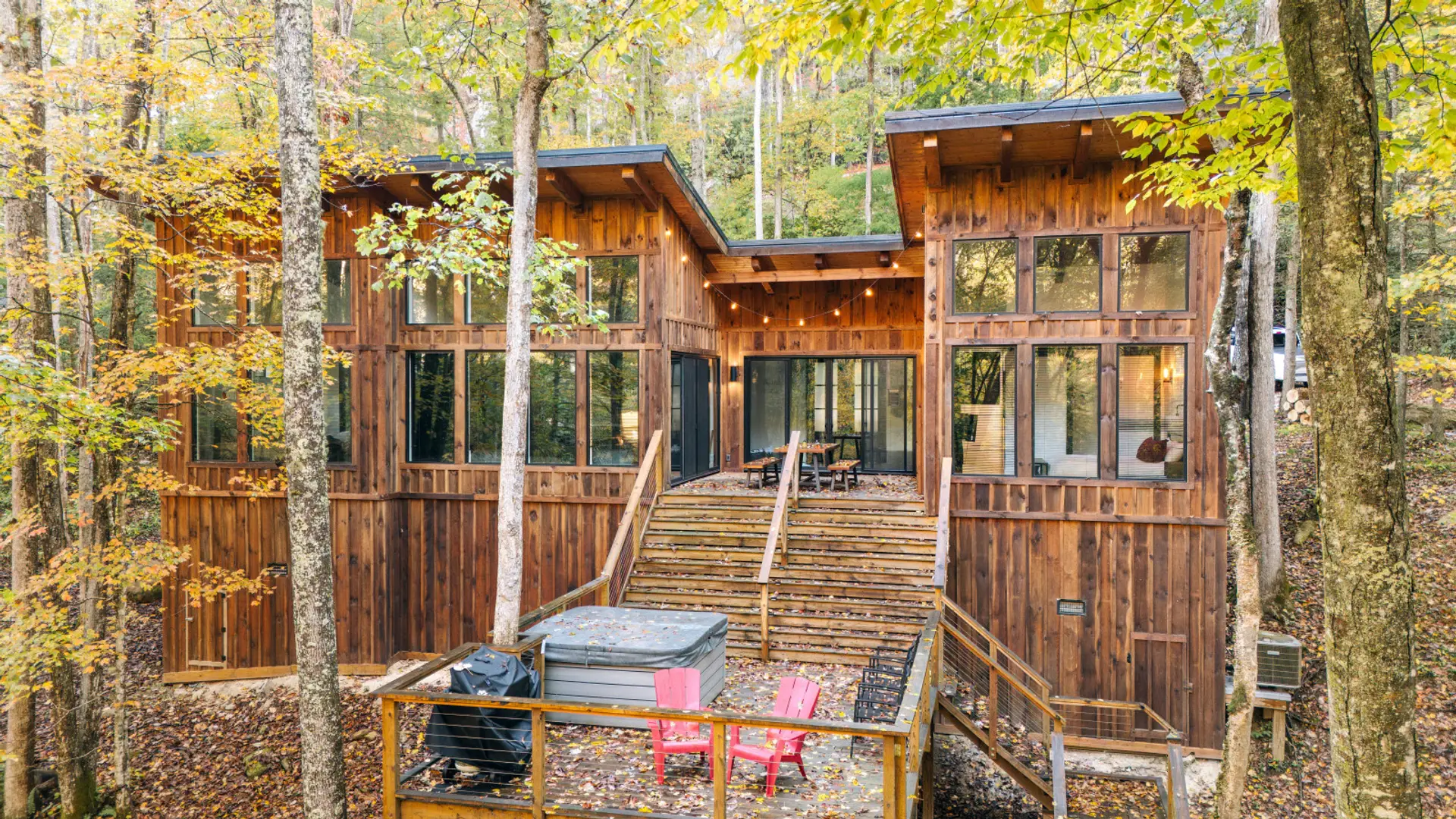 Welcome to Drop RED GORGEous by The Hideaways—a romantic Red River Gorge cabin with soaring windows, forest views, and a private hot tub perfect for stargazing together.