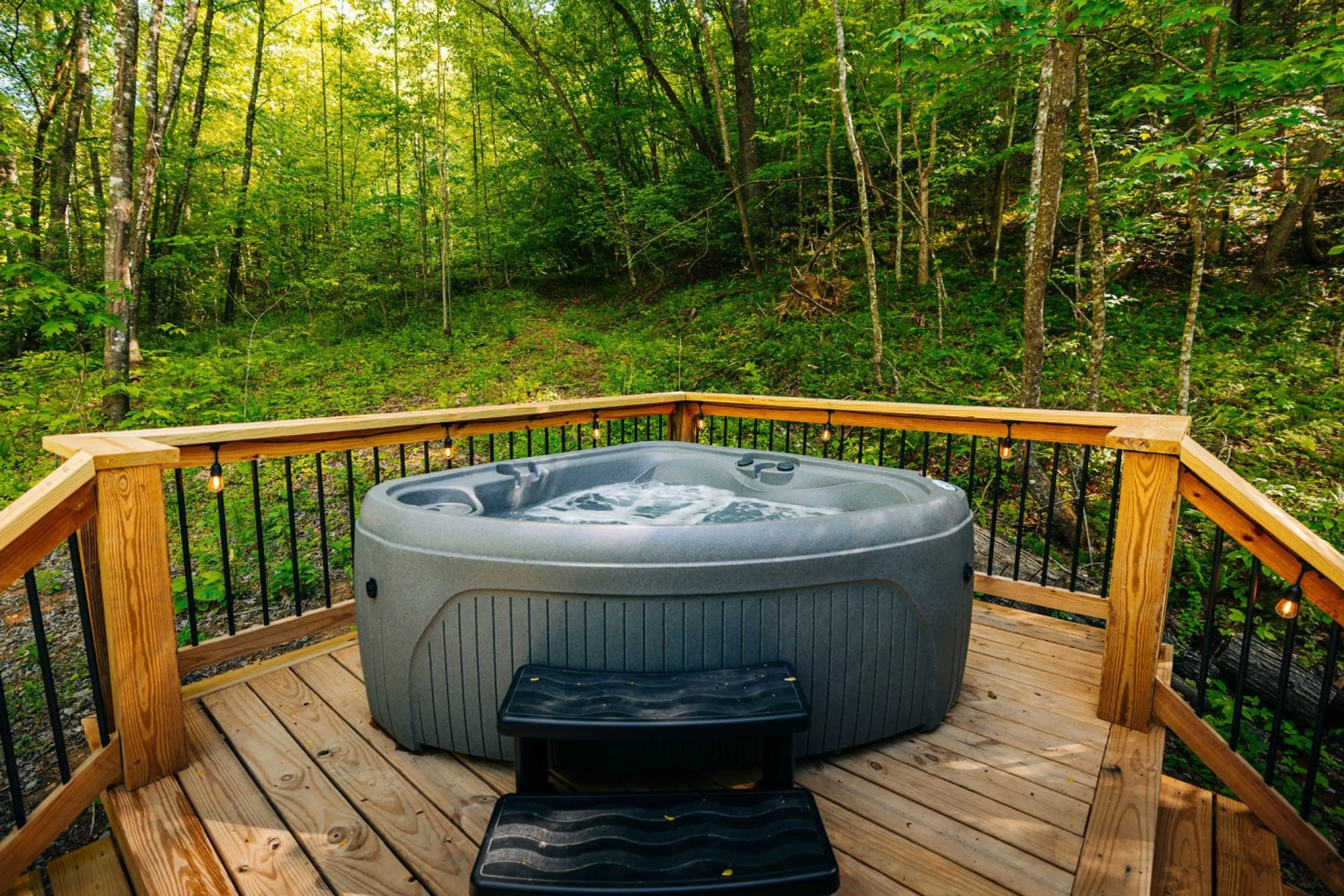 Yes, it’s open year-round. After a long day of exploring, soothe your muscles in our private hot tub overlooking the forest ravine.
