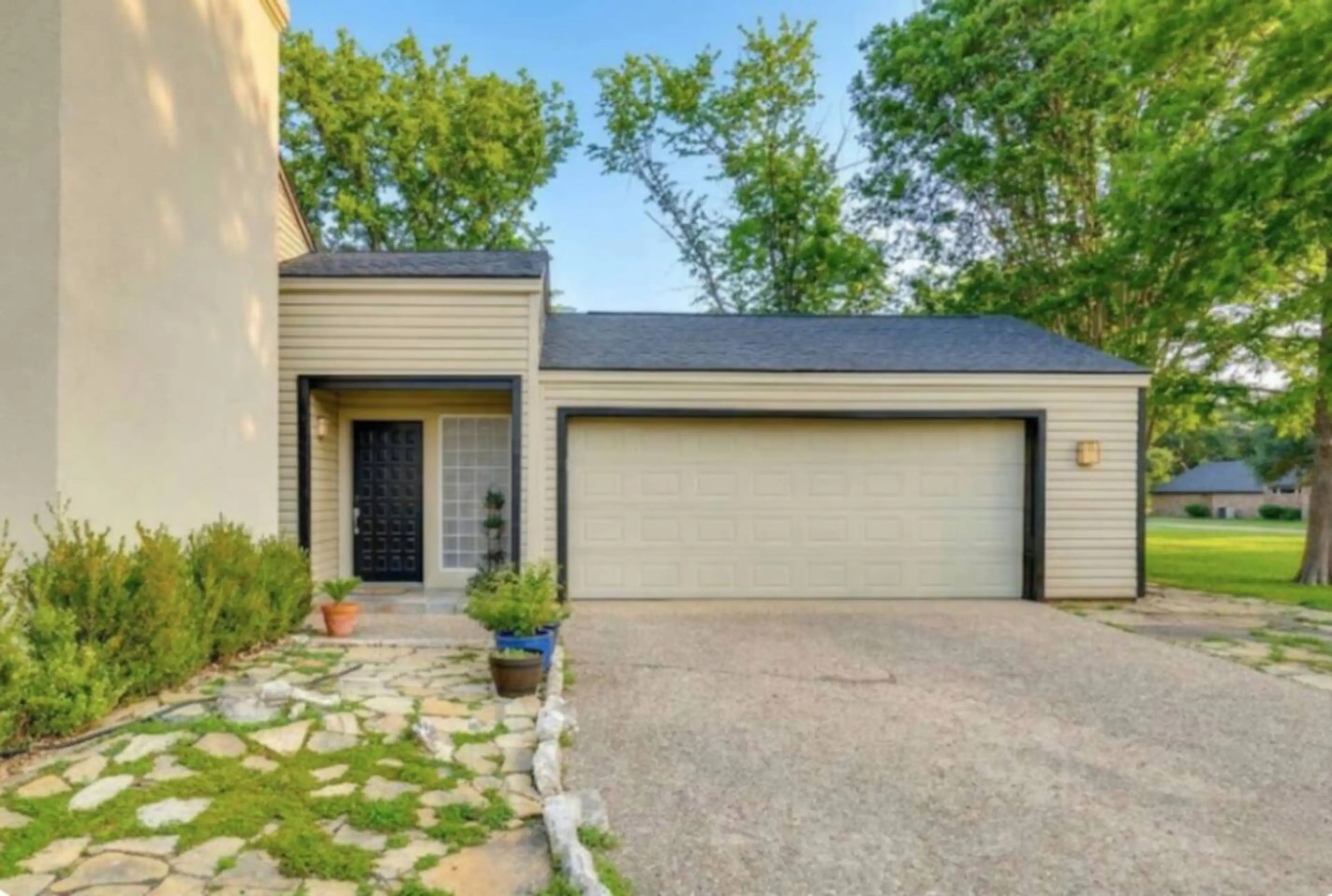 View of Property Entrance & Garage