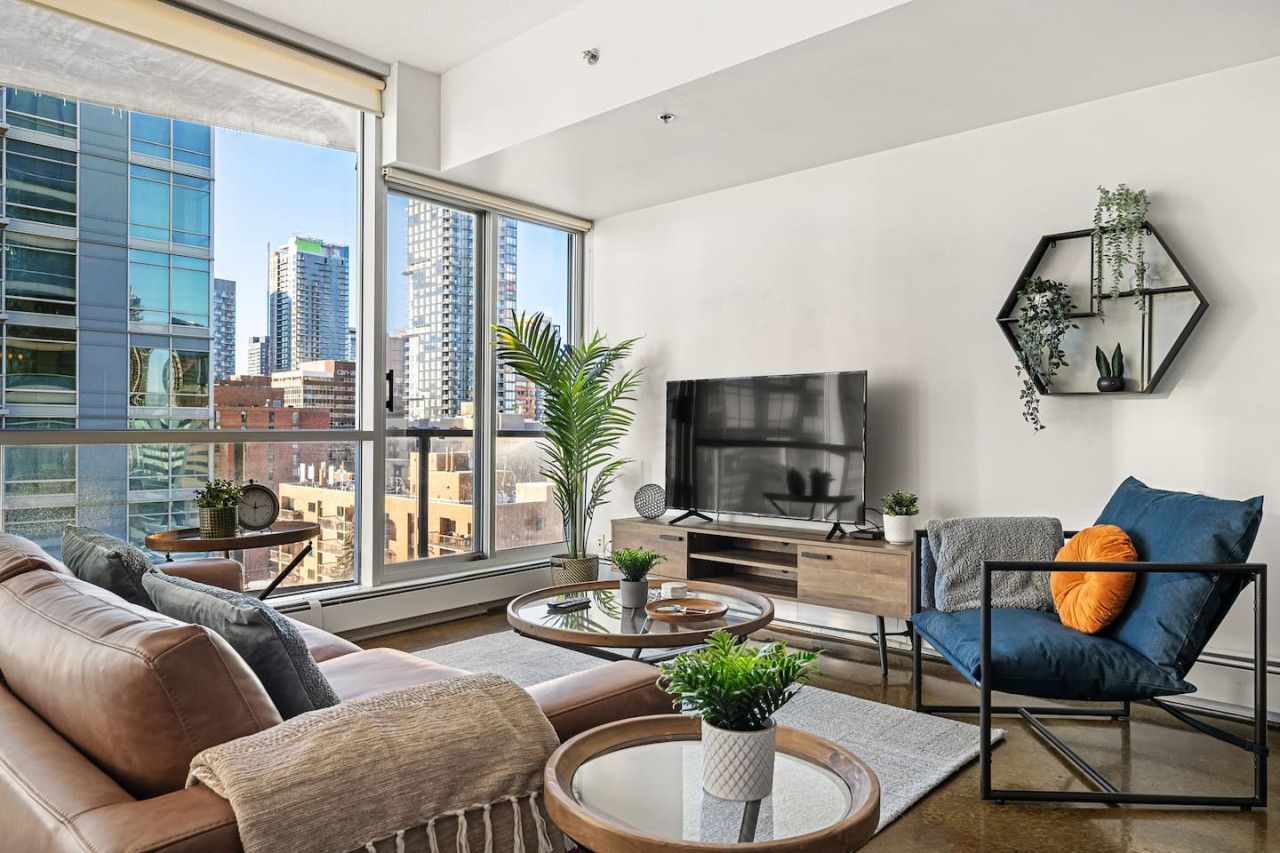 King Bed + Skyline View, Balcony, Heated Parking