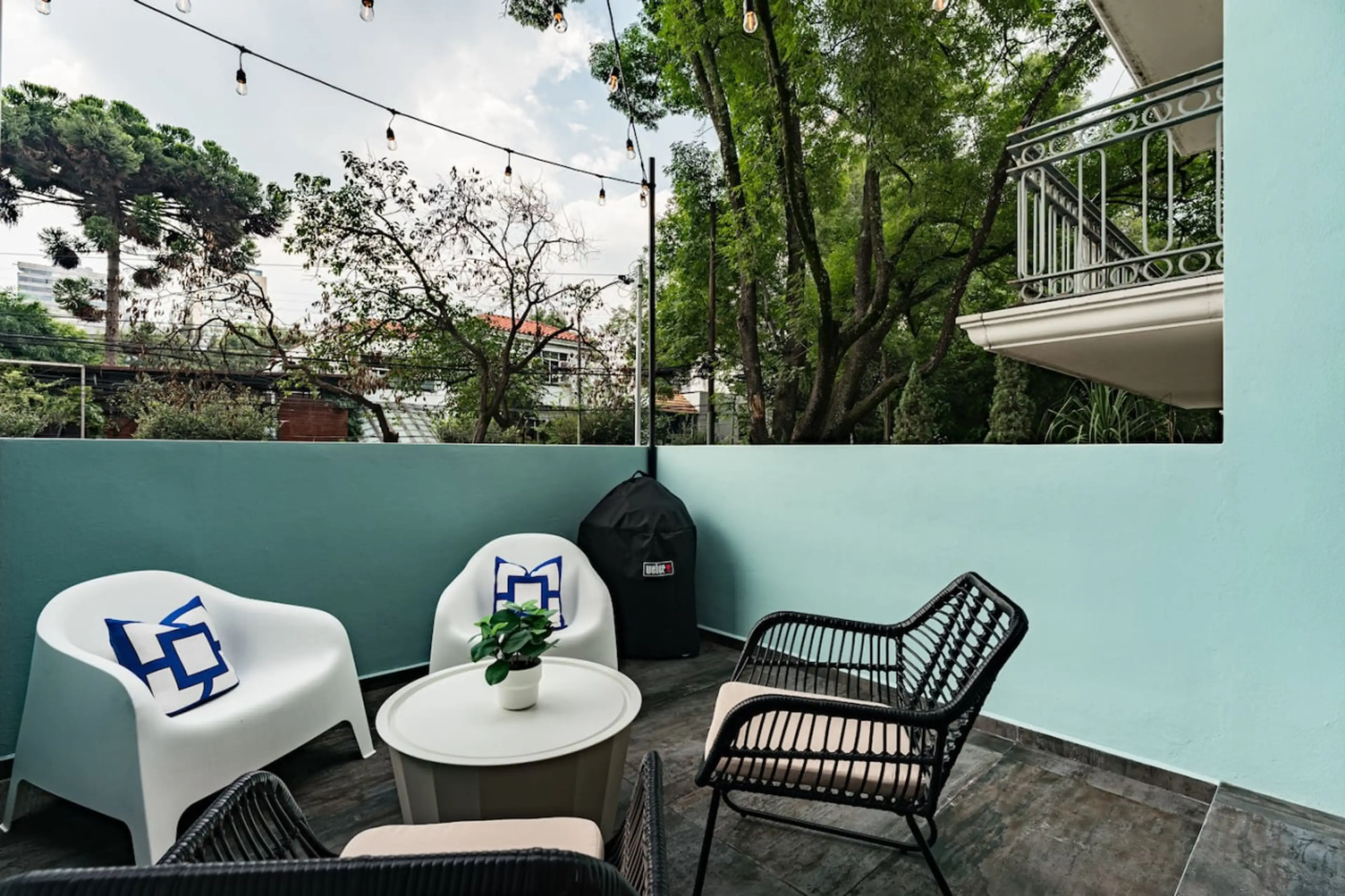 Private outdoor space with lush greenery, perfect for morning coffee